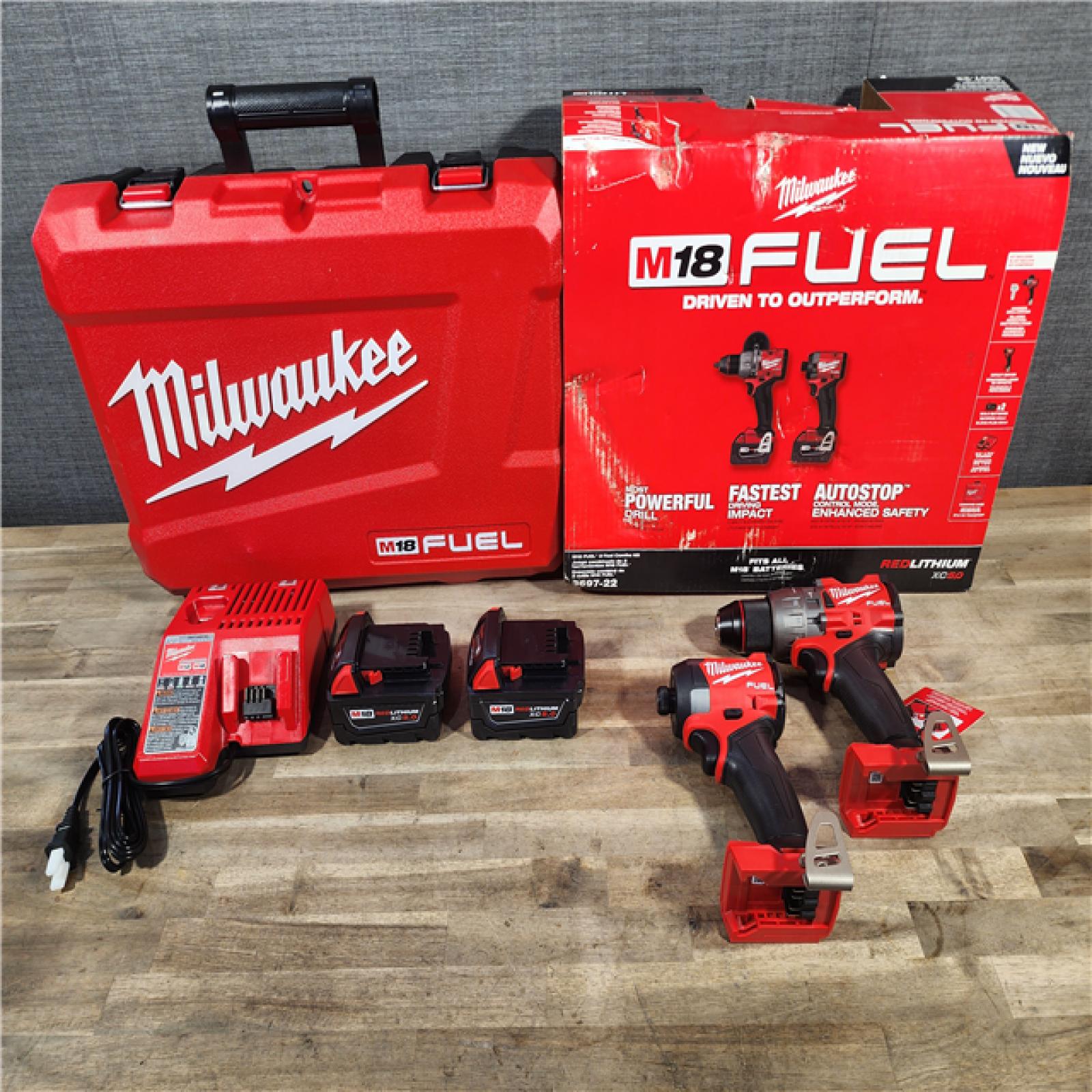 HOUSTON LOCATION - AS-IS (APPEARS LIKE NEW) MILWAUKEE FUEL 18V Lithium-Ion Brushless Cordless Hammer Drill and Impact Driver Combo Kit (2-Tool) with 2 Batteries