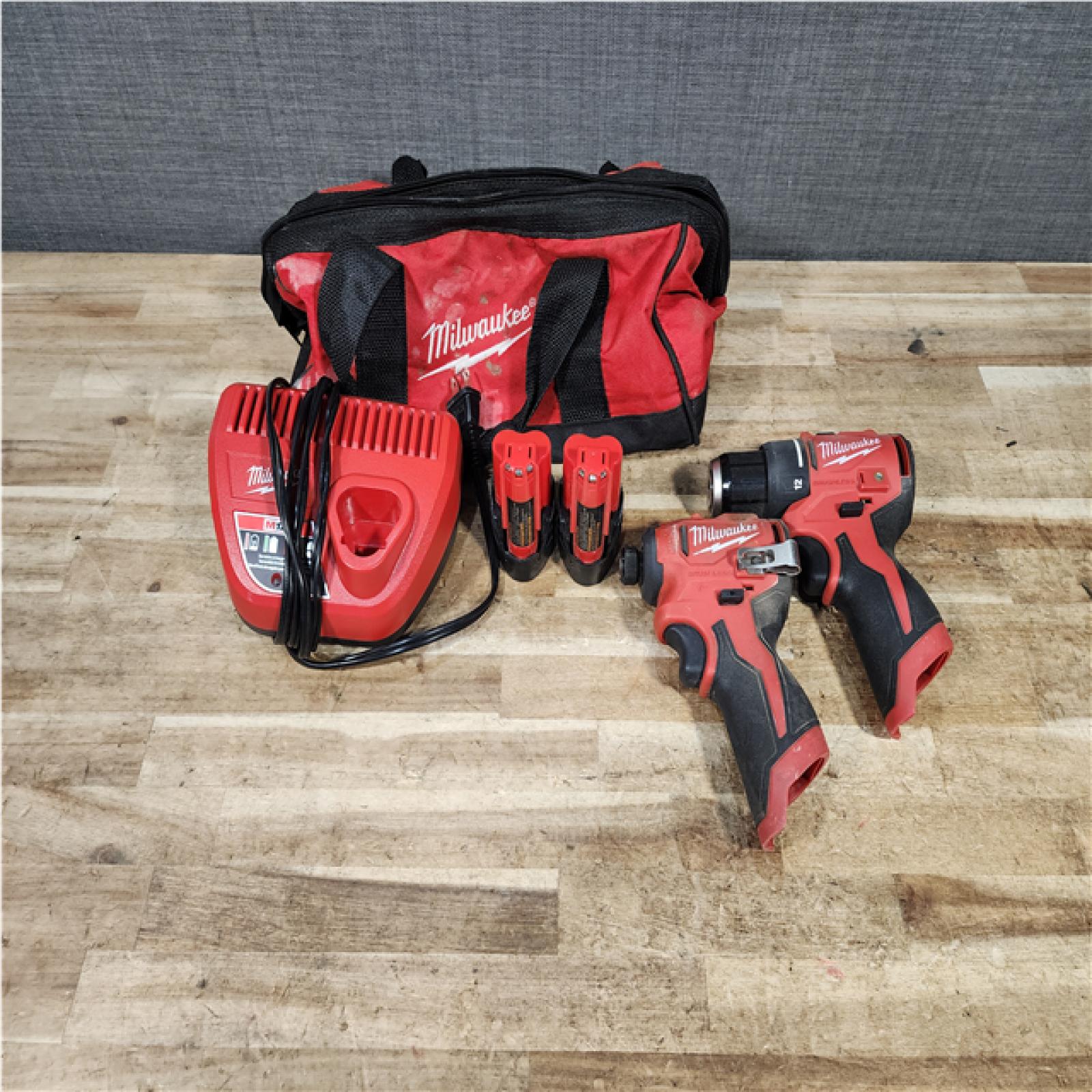 HOUSTON LOCATION - AS - IS Milwaukee 12-Volt Lithium-Ion Brushless Cordless Subcompact Drill and Impact Driver Combo Kit