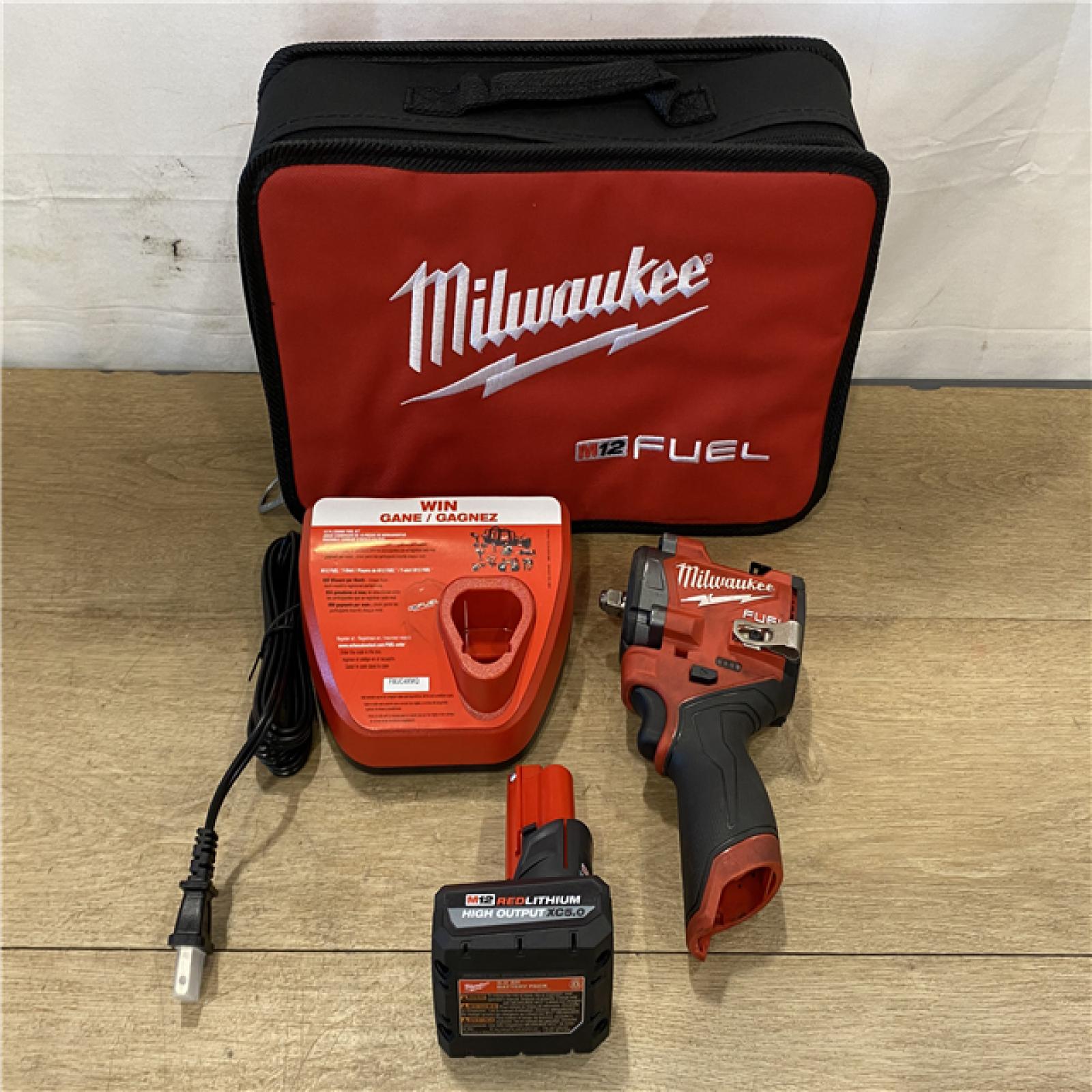 AS-IS Milwaukee FUEL 12V Li-Ion Brushless Cordless Stubby 3/8 in. Impact Wrench Kit