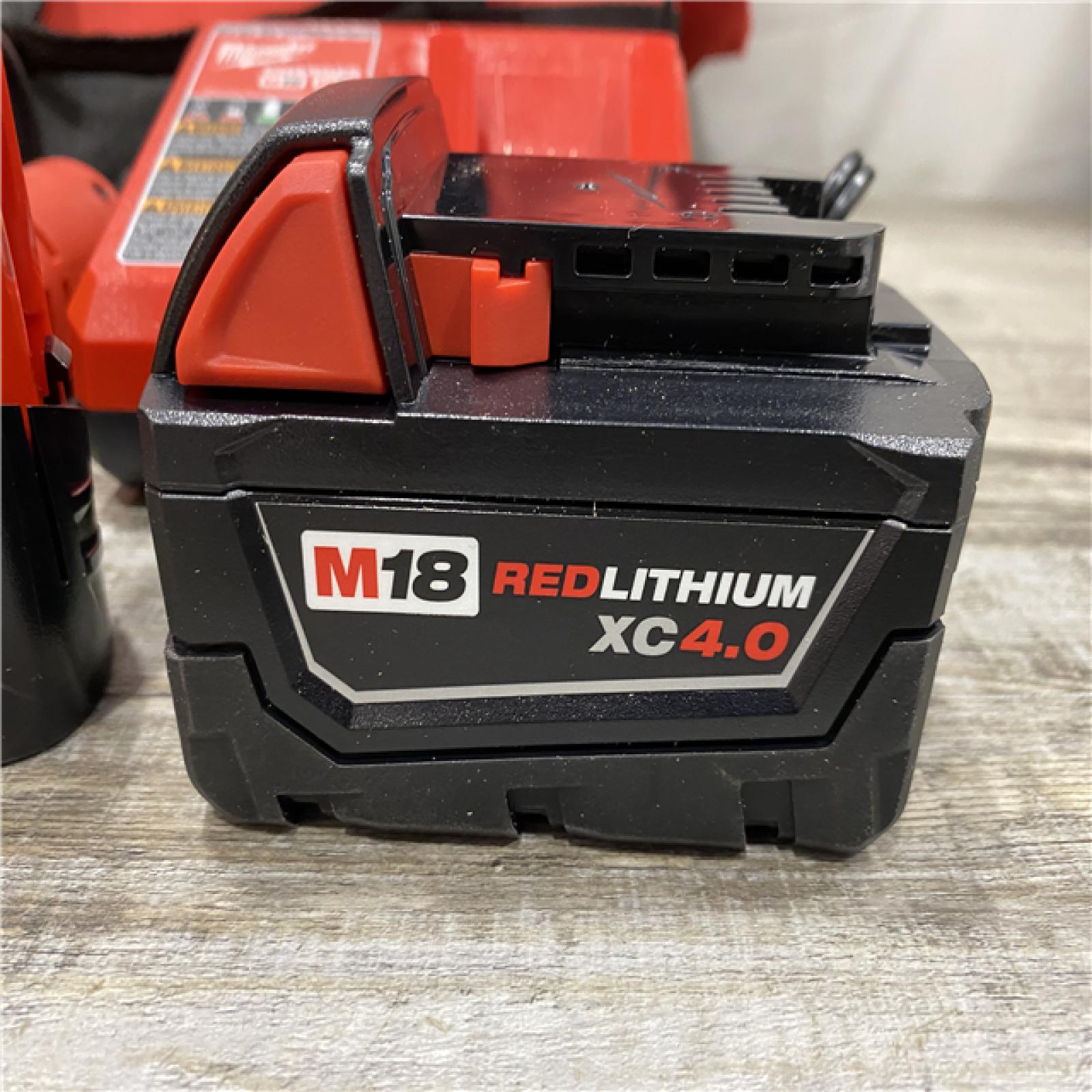 AS-IS Milwaukee 12/18V Lithium-Ion Cordless 3/8 in. Ratchet and 1/2 in. High Torque Impact Wrench with Friction Ring Combo Kit