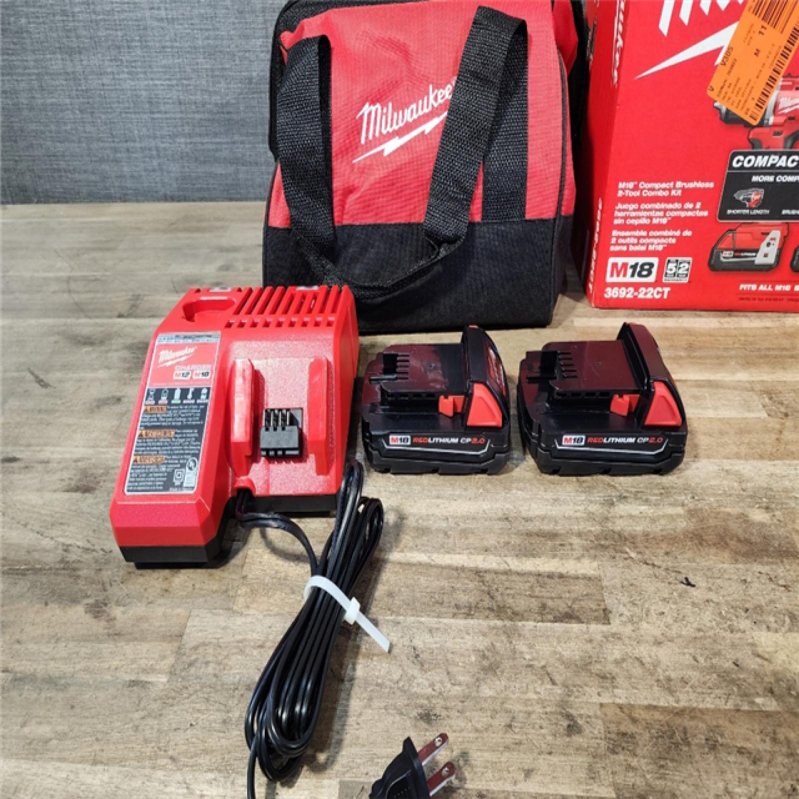 HOUSTON LOCATION - AS-IS Milwaukee M18 18V Lithium-Ion Brushless Cordless Compact Drill/Impact Combo Kit (2-Tool) W/(2) 2.0 Ah Batteries  Charger & Bag