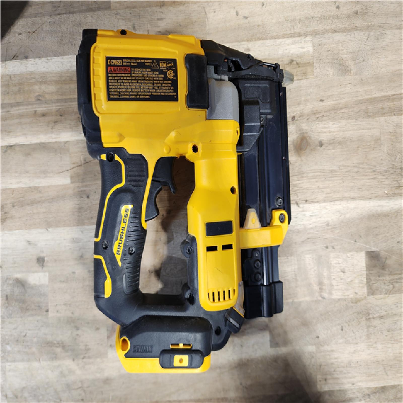 HOUSTON LOCATION - AS-IS DEWALT ATOMIC 20V MAX Lithium Ion Cordless 23 Gauge Pin Nailer Kit with 2.0Ah Battery and Charger