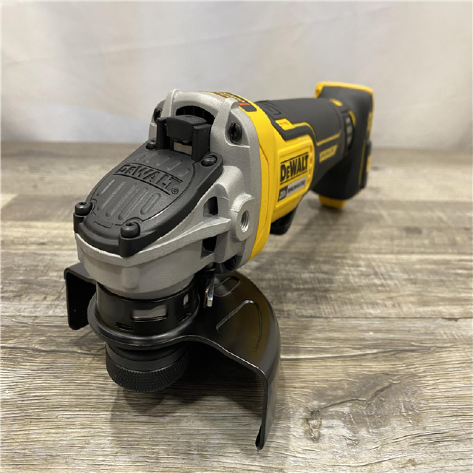 AS-IS DEWALT 20-Volt MAX XR Lithium-Ion Cordless Brushless 4-1/2 in. Paddle Switch Small Angle Grinder w/ Kickback Brake (Tool-Only)