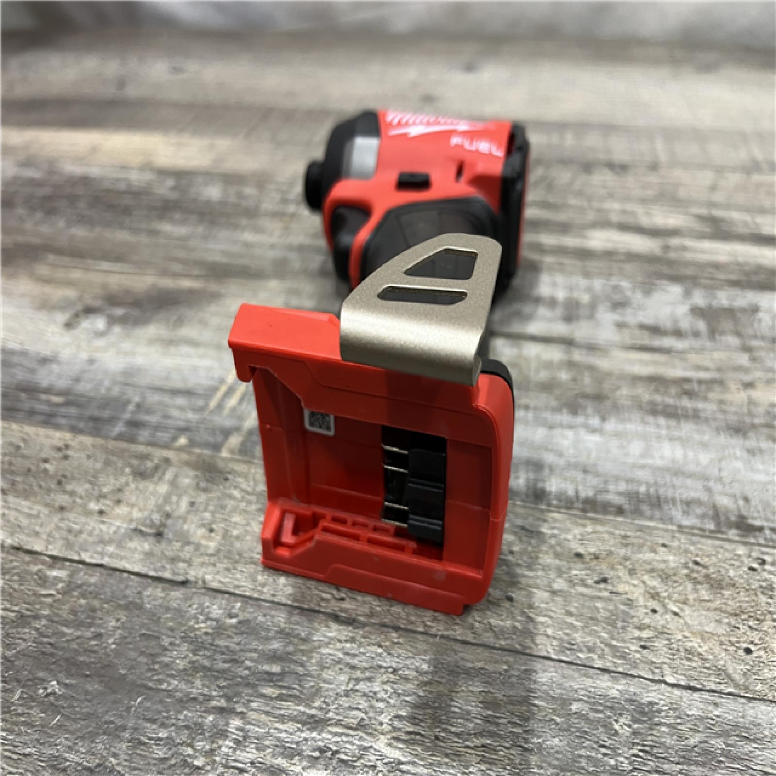 AS-IS Milwaukee FUEL 18V Lithium-Ion Brushless Cordless 1/4 in. Hex Impact Driver (Tool-Only)