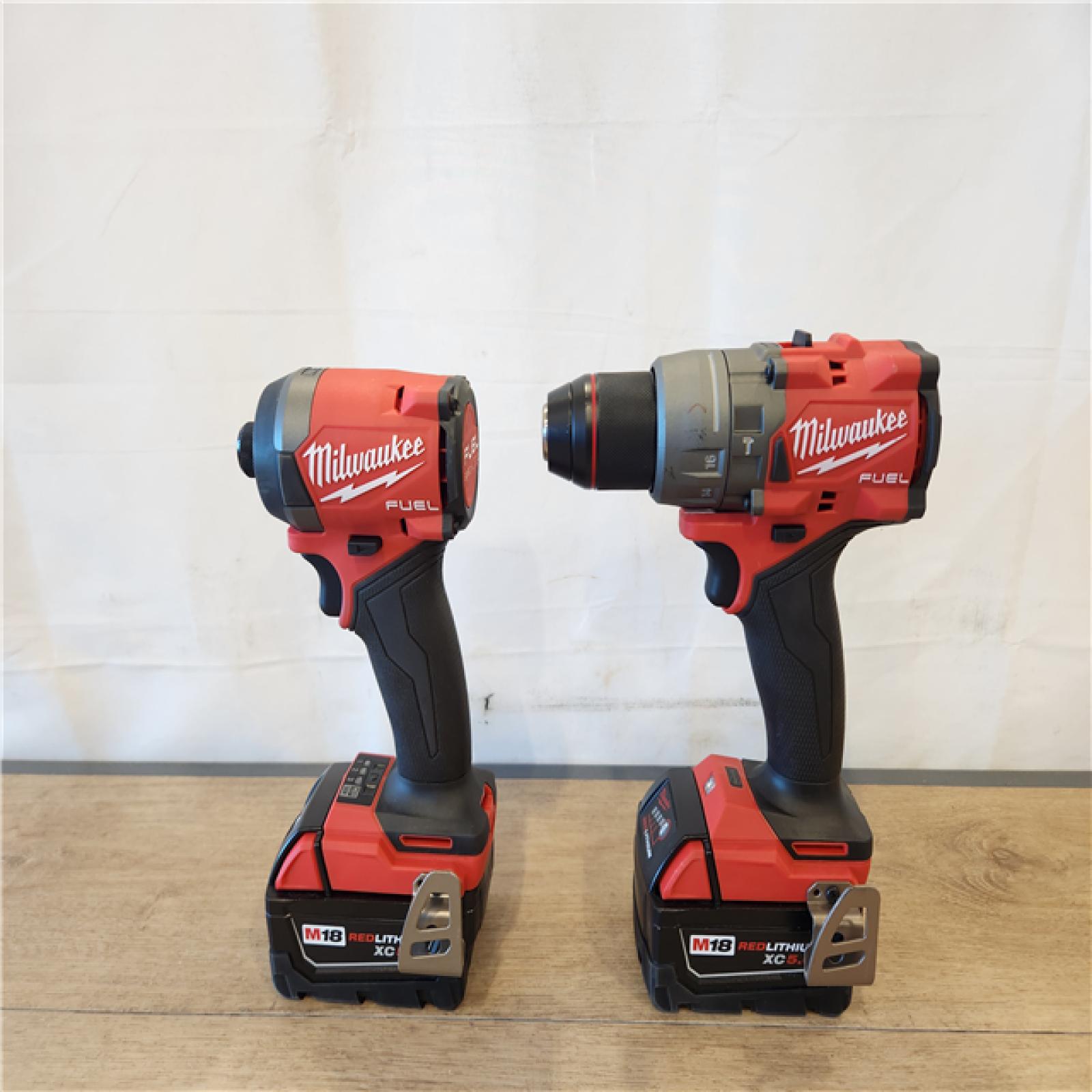 AS-IS- Milwaukee FUEL 18V Lithium-Ion Brushless Cordless Hammer Drill and Impact Driver Combo Kit
