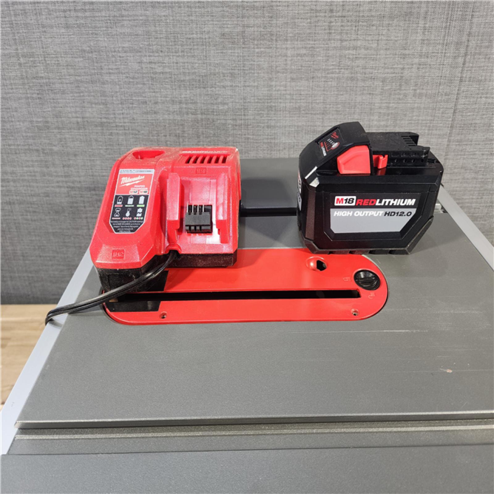 HOUSTON LOCATION - AS-IS Milwaukee M18 FUEL ONE-KEY 18- Volt Lithium-Ion Brushless Cordless 8-1/4 in. Table Saw Kit W/(1) 12.0Ah Battery & Rapid Charger