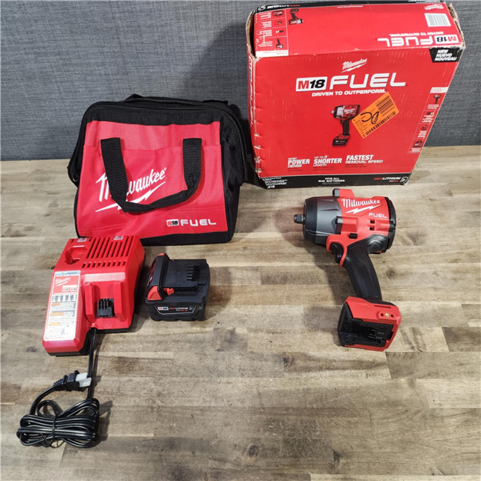 HOUSTON LOCATION - AS-IS (APPEARS LIKE NEW) Milwaukee M18 1/2 in. Cordless Brushless High Torque Impact Wrench Kit (Battery & Charger)