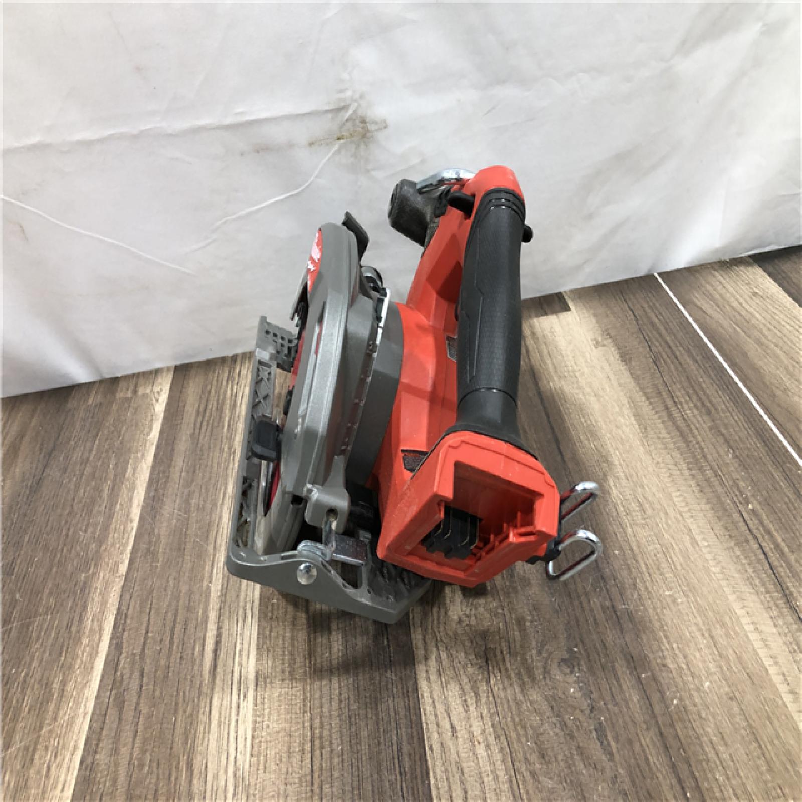 AS-IS Milwaukee FUEL 18V Lithium-Ion Brushless Cordless 6-1/2 in. Circular Saw (Tool-Only)