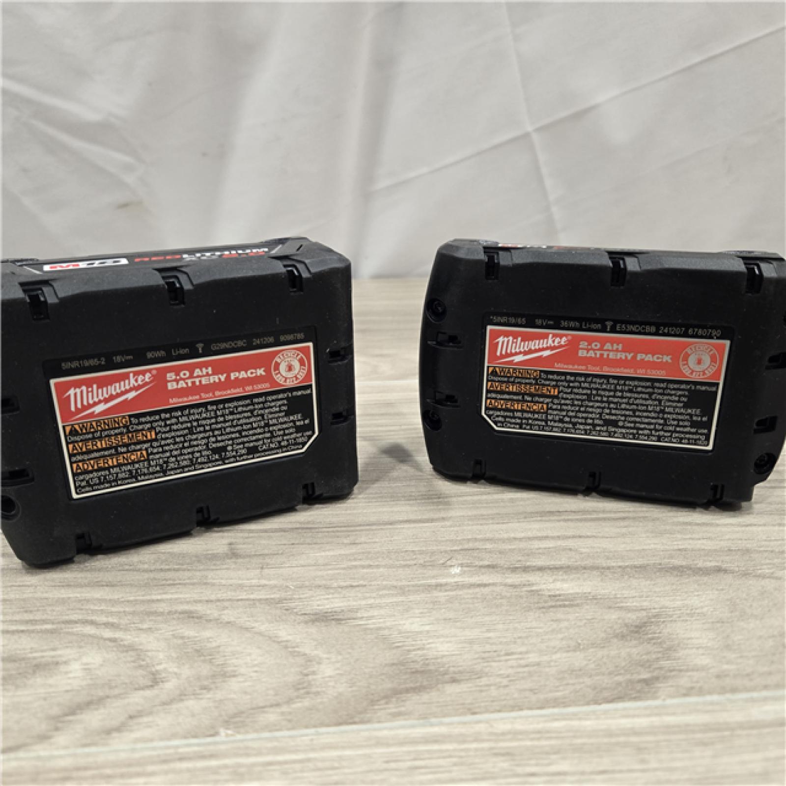 AS-IS Milwaukee M18 18V Starter Kit with One 5.0 Ah and One 2.0 Ah Battery and Charger