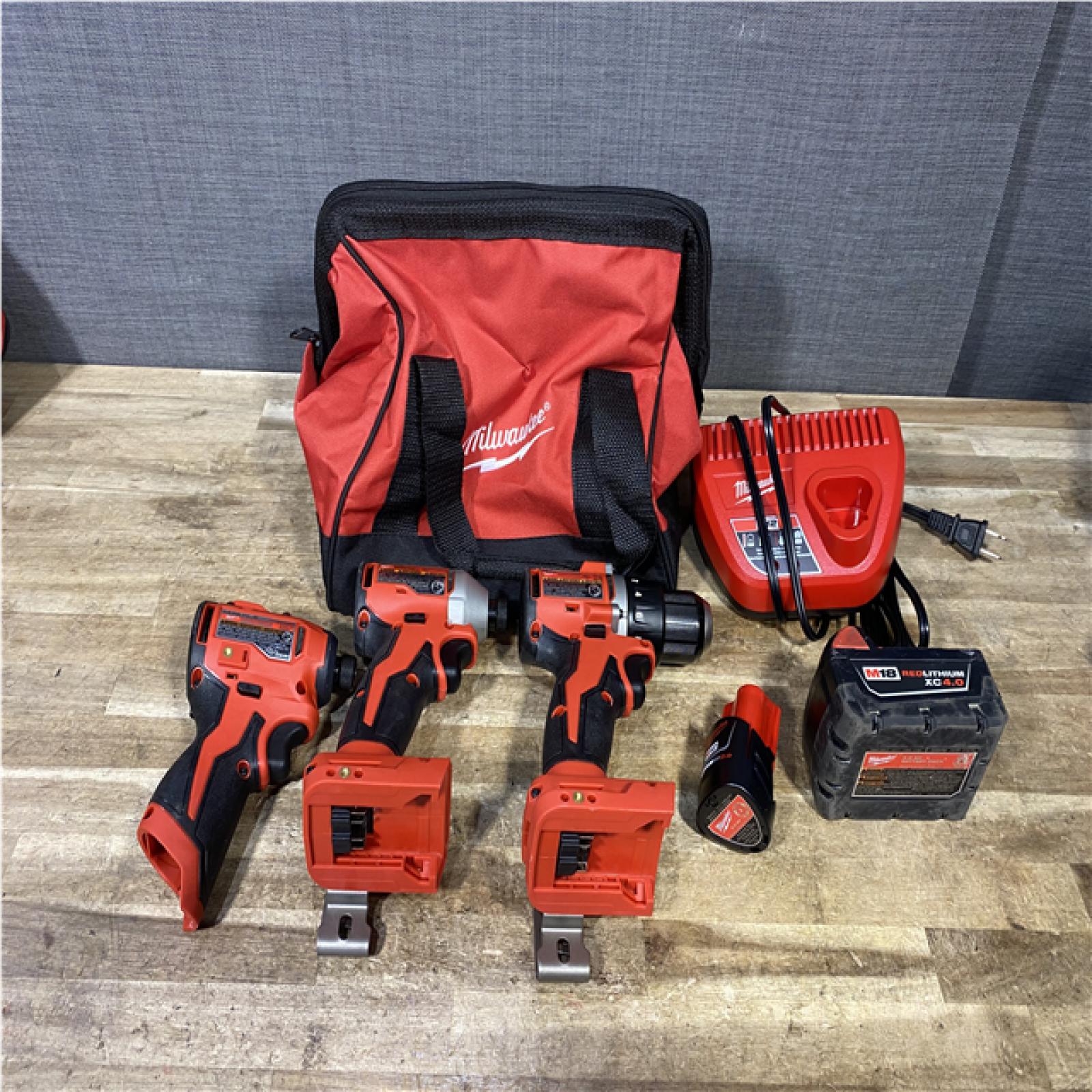 Houston Location AS-IS Milwaukee Drill Driver and Impact Drivers QTY/2 and Batteries QTY/2 with Charger