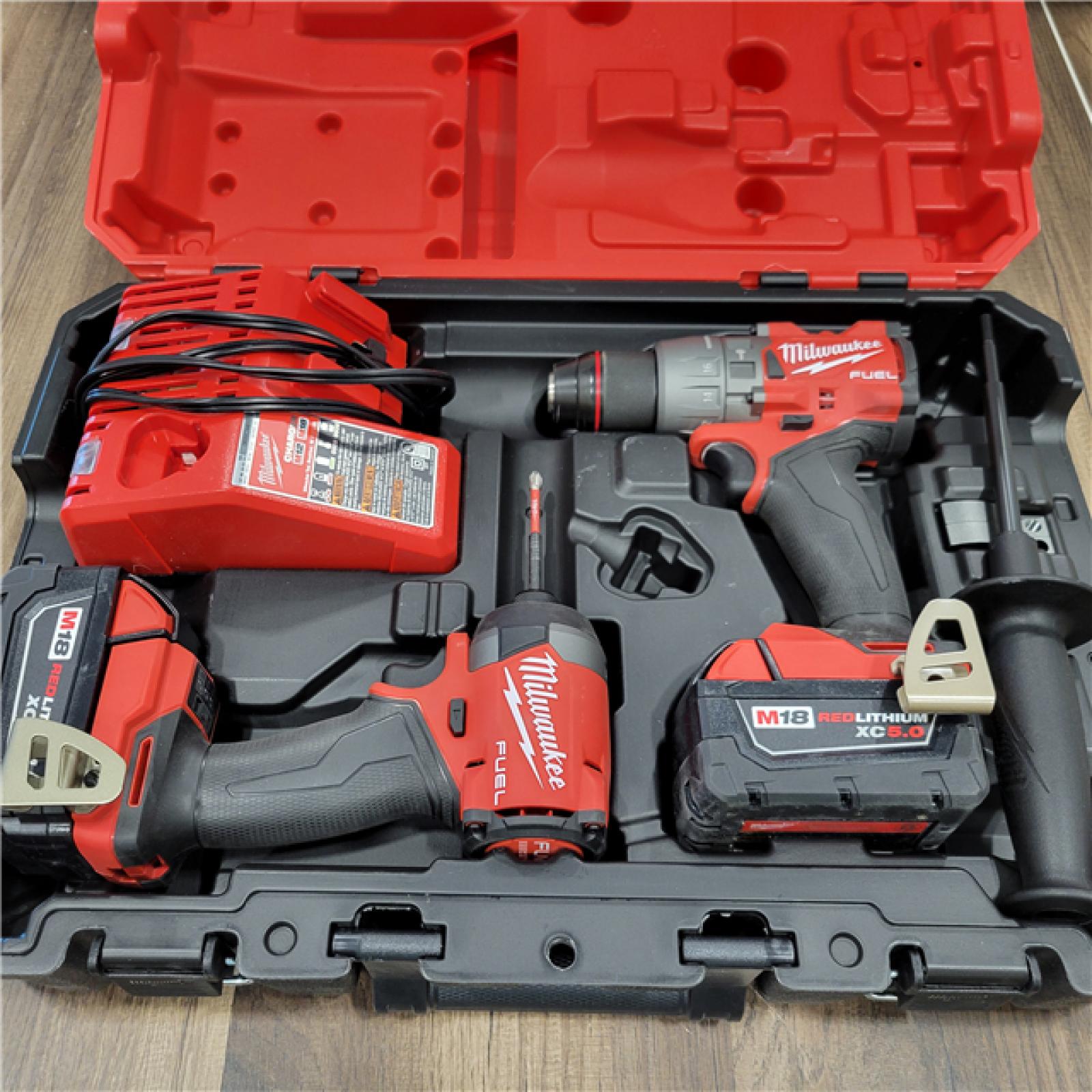 AS-IS M18 FUEL 18V Lithium-Ion Brushless Cordless Hammer Drill and Impact Driver Combo Kit (2-Tool) with 2 Batteries