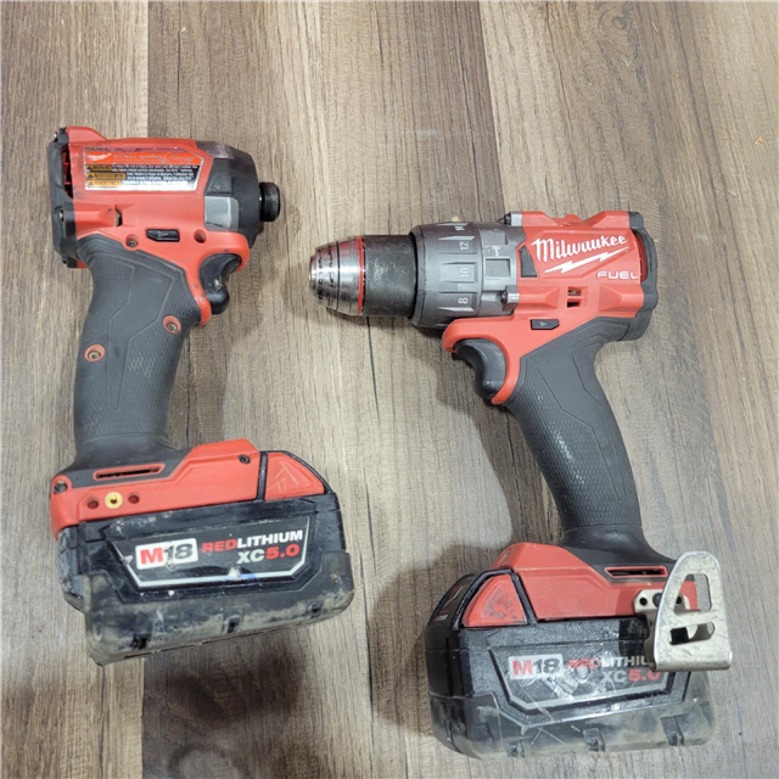 AS-IS Milwaukee M18 FUEL 18V Lithium-Ion Brushless Cordless Hammer Drill and Impact Driver Combo Kit (2-Tool) with 2 Batteries