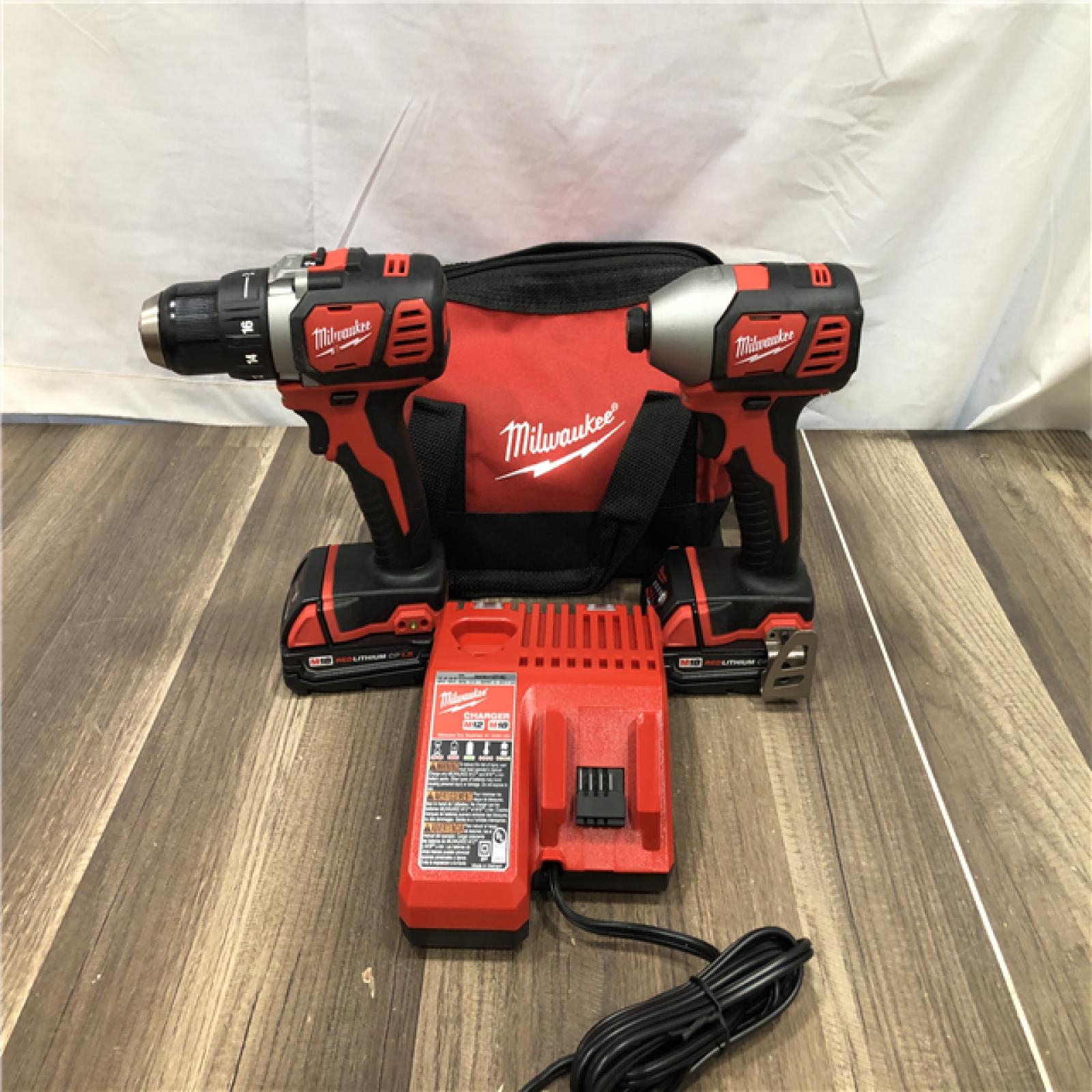 AS-IS Milwaukee 18V Lithium-Ion Cordless Drill Driver/Impact Driver Combo Kit