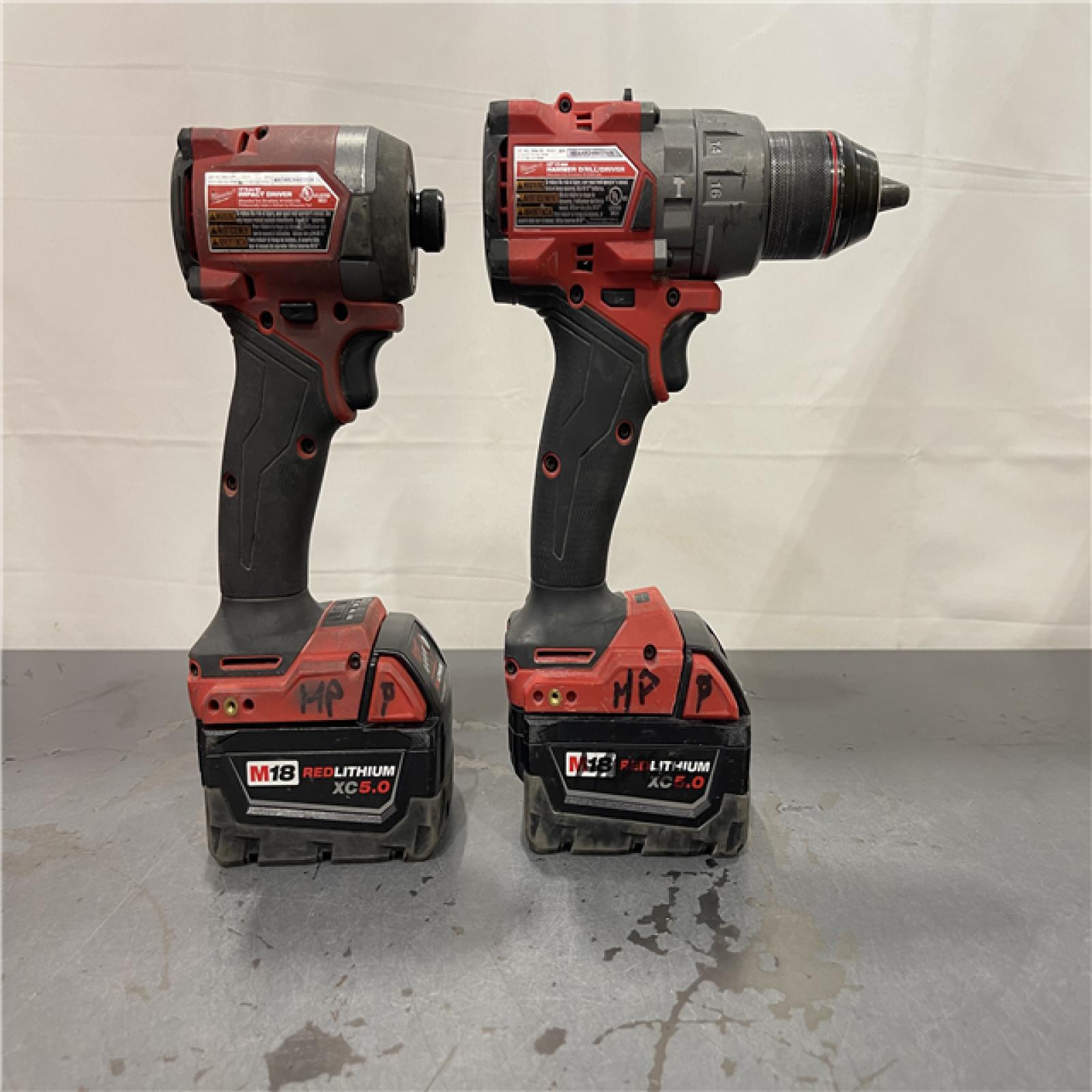 AS-IS - MILWAUKEE FUEL 18V Lithium-Ion Brushless Cordless Hammer Drill and Impact Driver Combo Kit