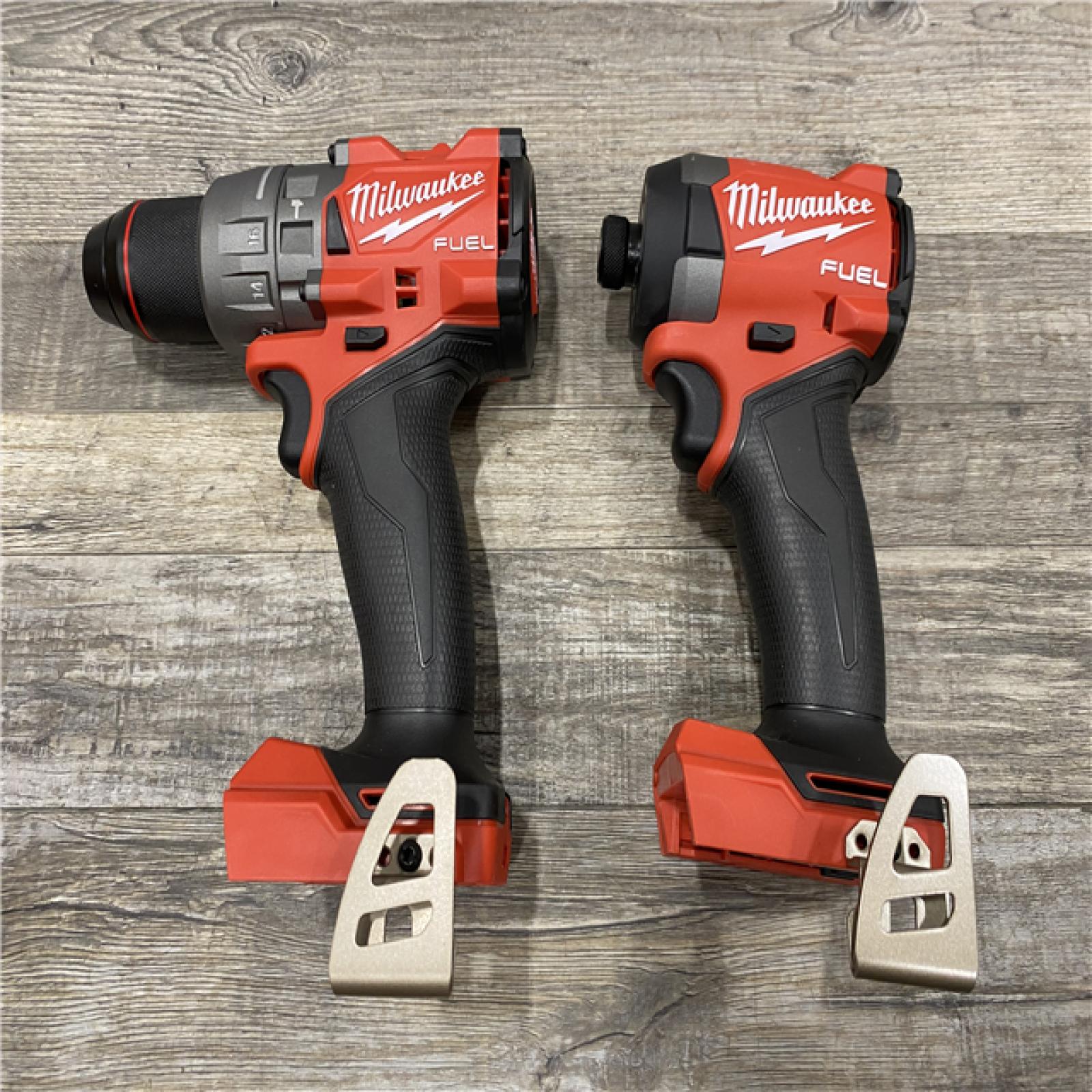 AS-IS Milwaukee FUEL 18V Lithium-Ion Brushless Cordless Hammer Drill and Impact Driver Combo Kit