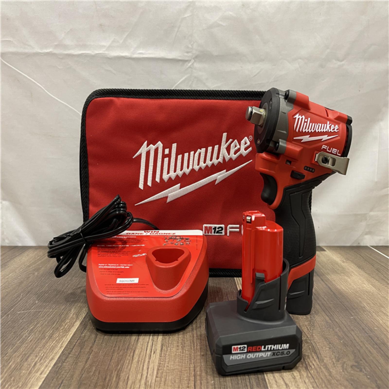 AS-IS Milwaukee FUEL 12V Li-Ion Brushless Cordless Stubby 1/2 in. Impact Wrench Kit