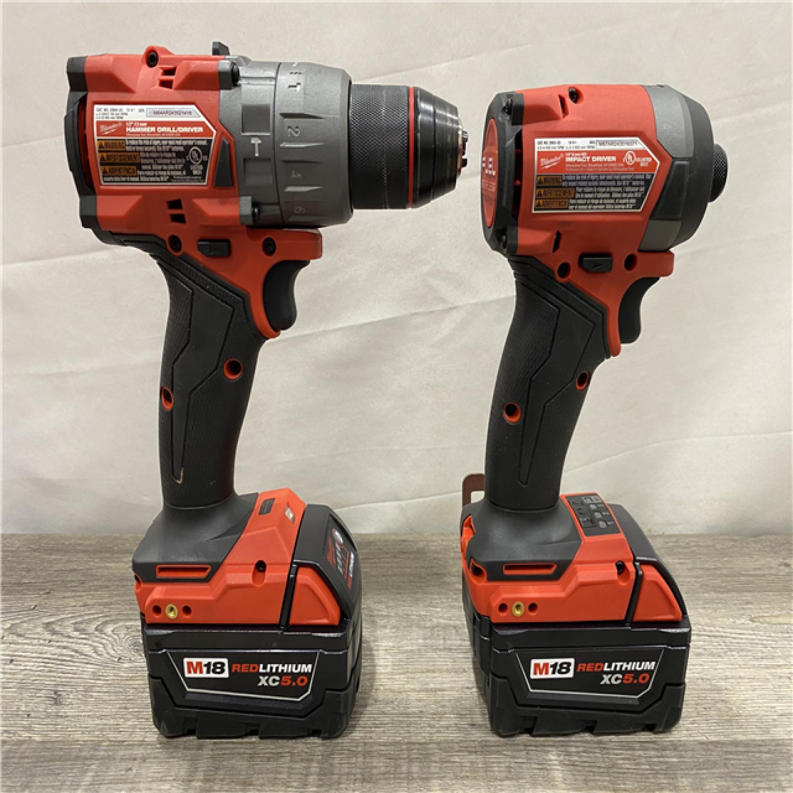 AS-IS Milwaukee FUEL 18V Lithium-Ion Brushless Cordless Hammer Drill and Impact Driver Combo Kit