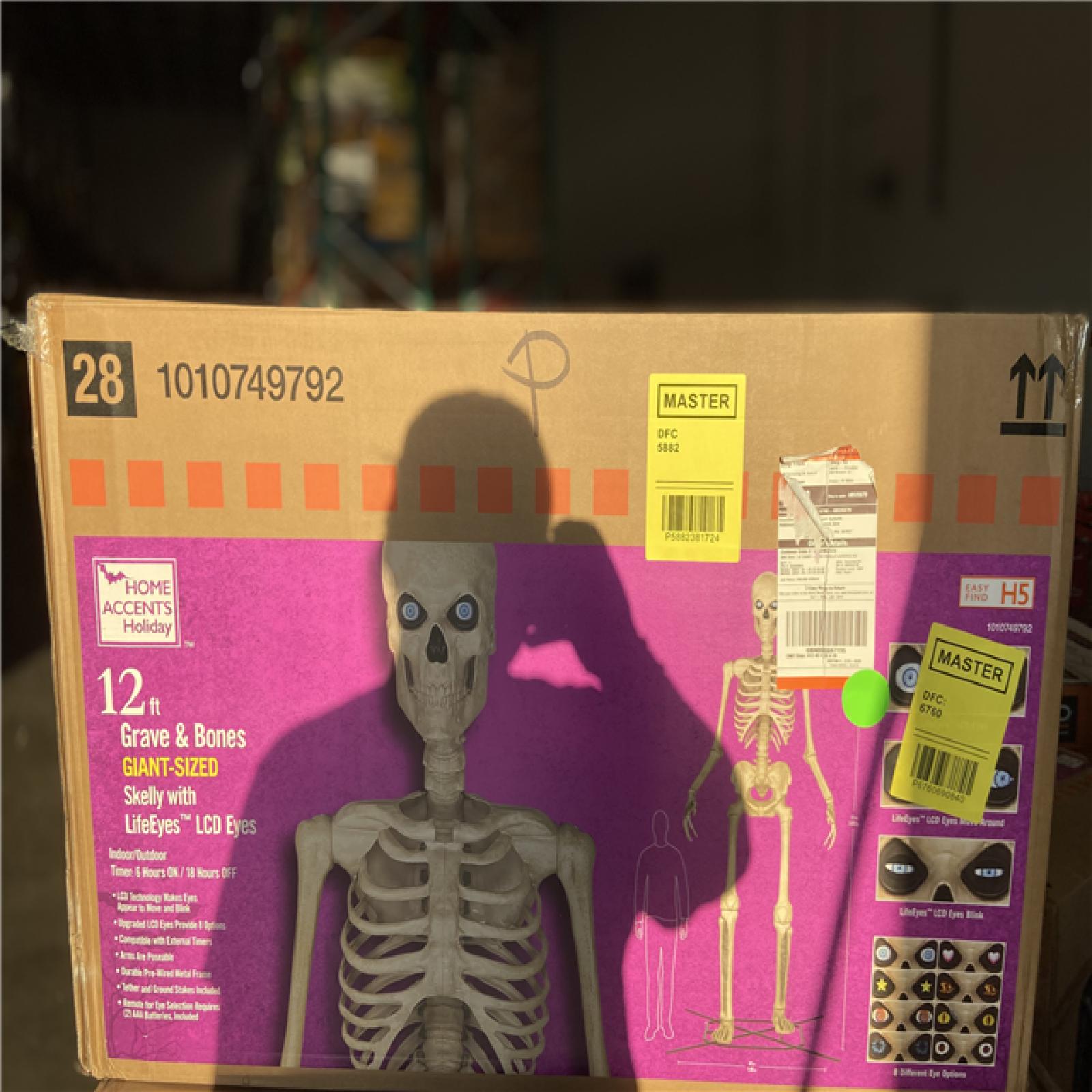 DALLAS LOCATION - Home Accents Holiday 12 ft. Grave & Bones Giant-Sized Skelly with LifeEyes™ LCD Eyes H5