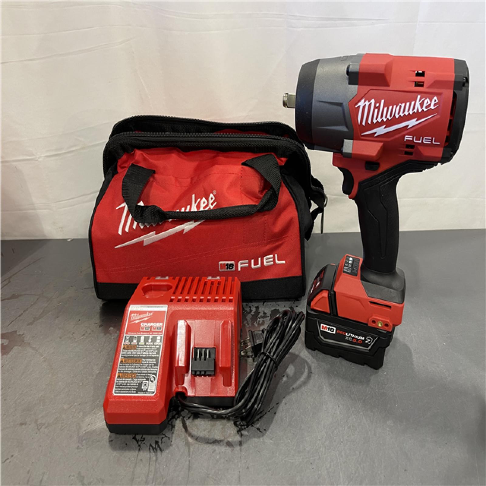 AS-IS - Milwaukee M18 FUEL 18V Lithium-Ion Brushless Cordless 1/2 in. Impact Wrench w/Friction Ring Kit