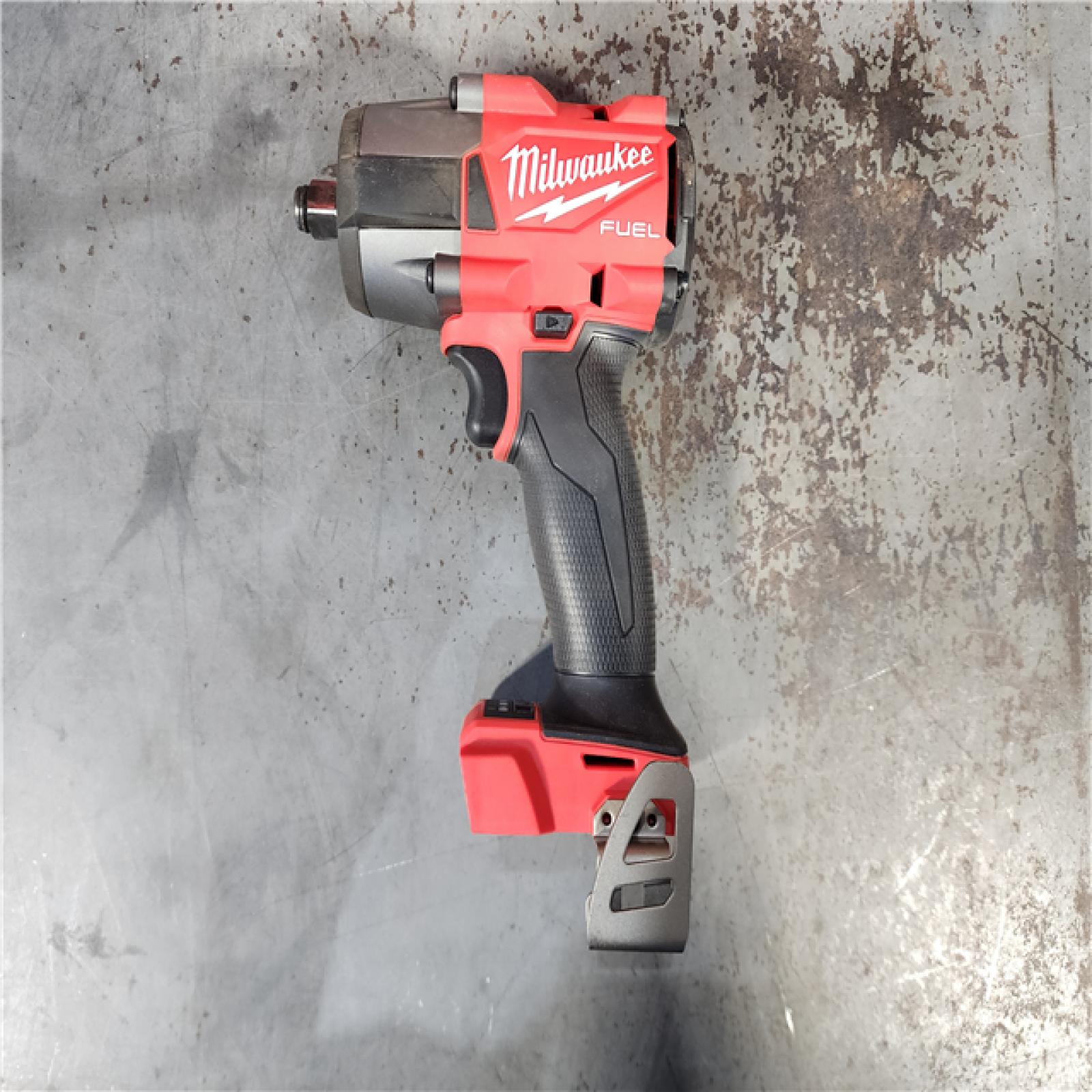 HOUSTON LOCATION - AS-IS Milwaukee M18 18V Fuel 1/2  Mid-Torque Impact Wrench Cordless Lithium-Ion Brushless with Friction Ring 2962-20 (TOOL ONLY)