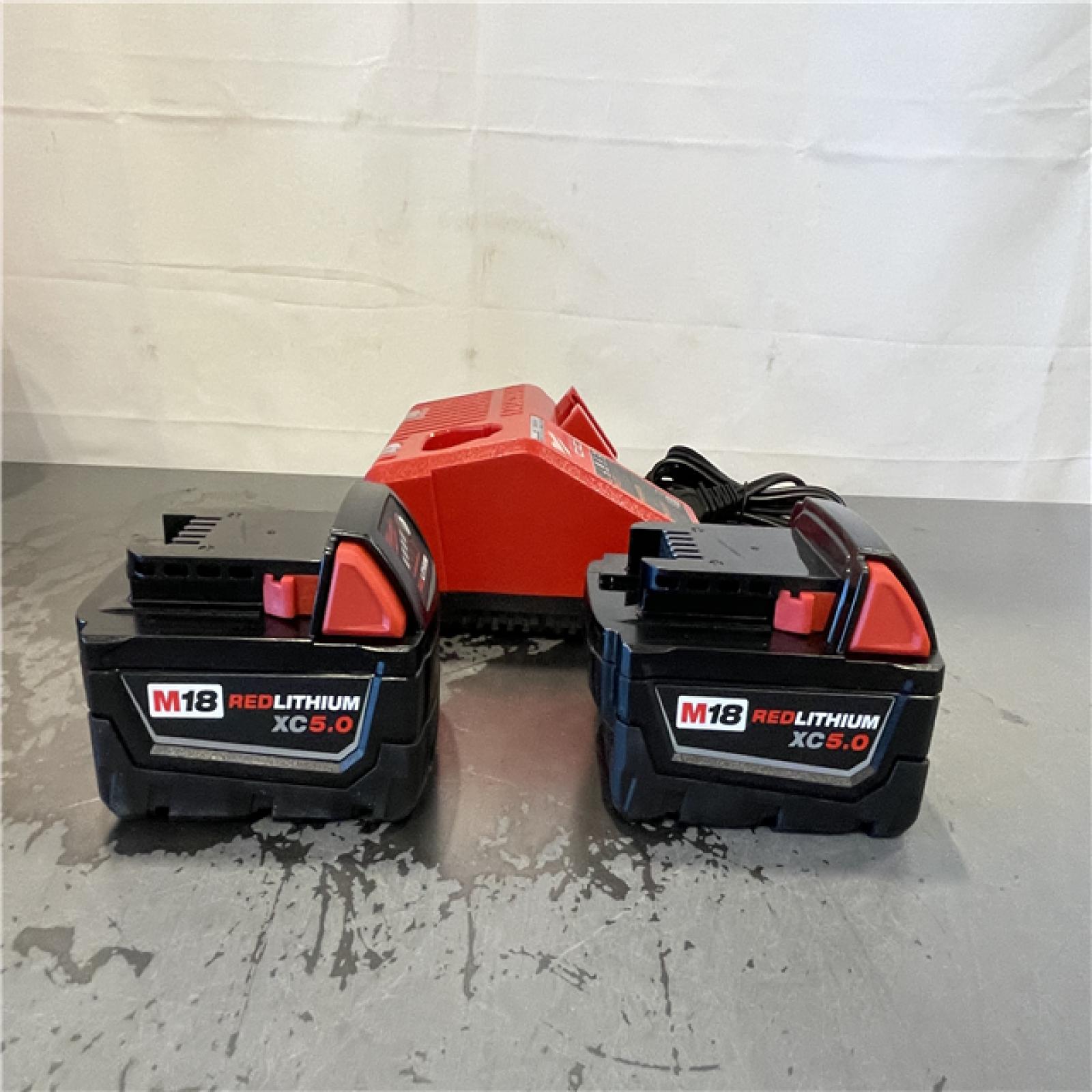 AS-IS- Milwaukee M18 18-Volt Lithium-Ion XC Starter Kit with Two 5.0Ah Batteries and Charger