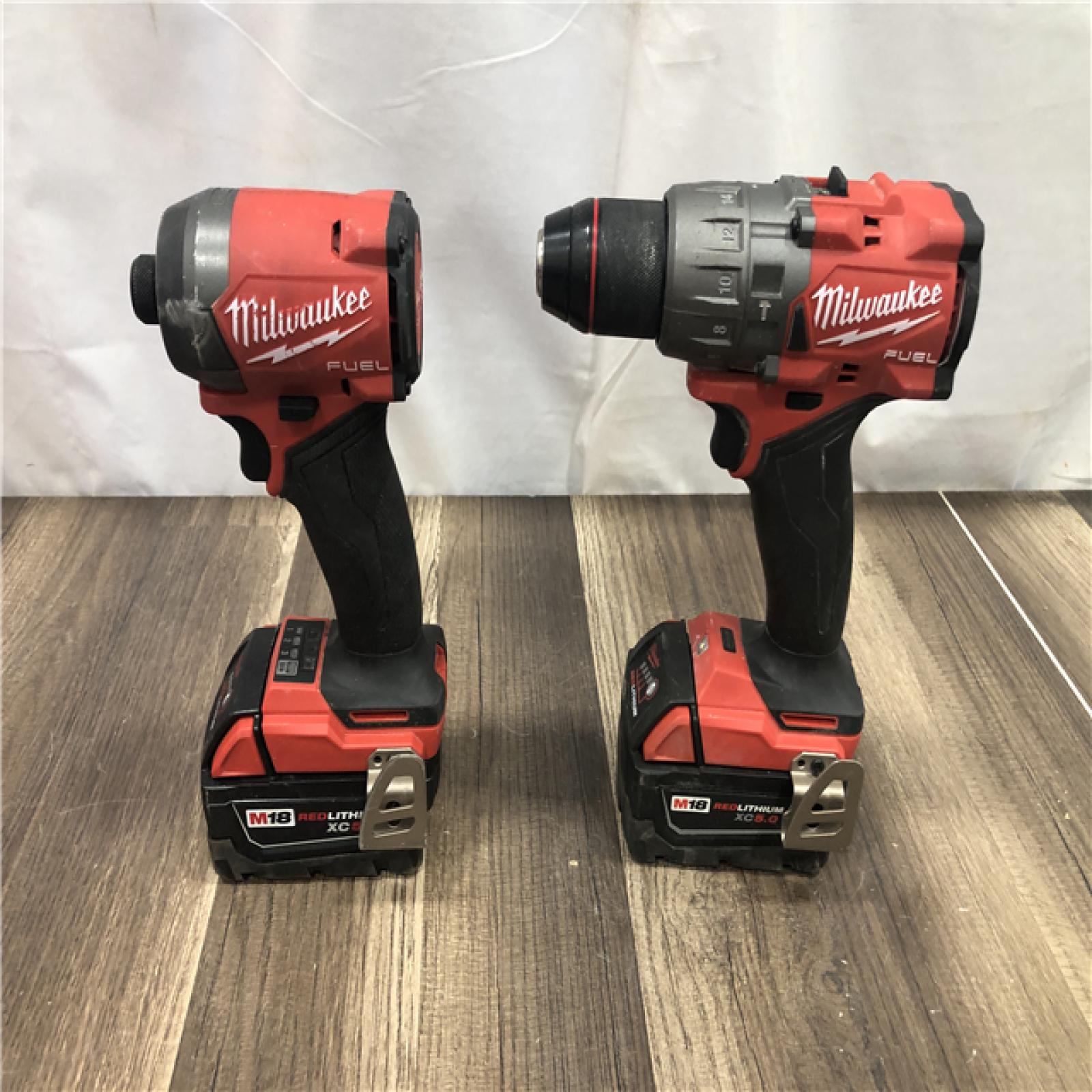 AS-IS Milwaukee FUEL 18V Lithium-Ion Brushless Cordless Hammer Drill and Impact Driver Combo Kit