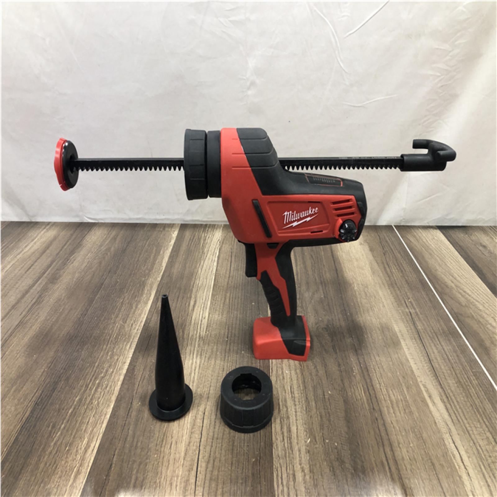 AS-IS M18 18V Lithium-Ion Cordless 20 Oz. Caulk and Adhesive Gun Kit Aluminum Sausage W/(1) 1.5Ah Battery  Charger