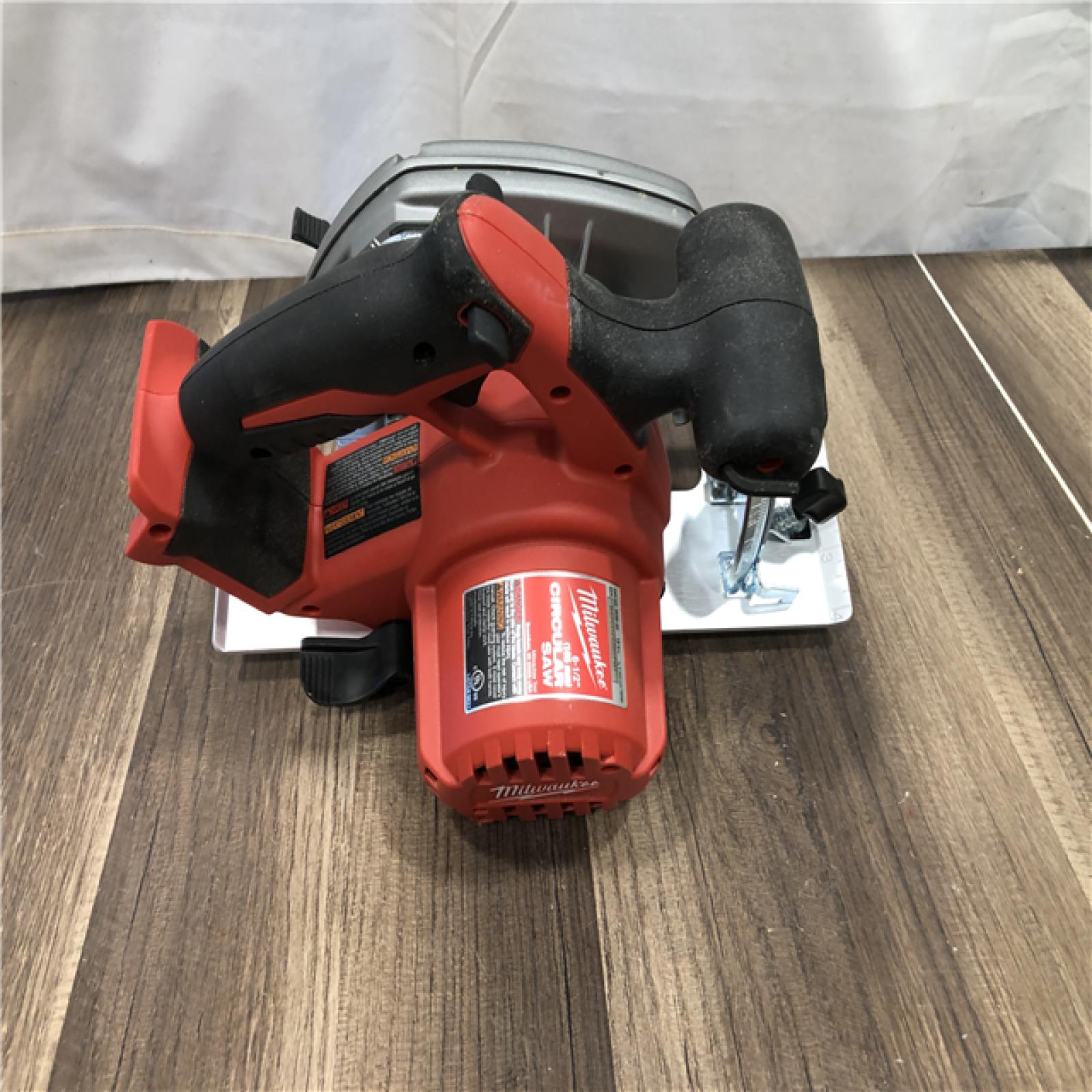 AS-IS Milwaukee 18V Lithium-Ion Cordless 6-1/2 in. Circular Saw (Tool-Only)