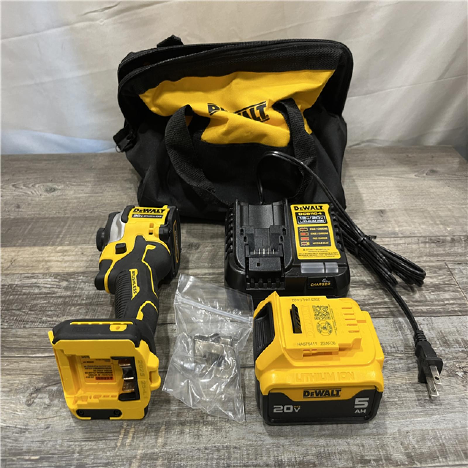 AS-IS DEWALT ATOMIC 20V MAX Lithium-Ion Cordless 1/4 in. Brushless Impact Driver Kit