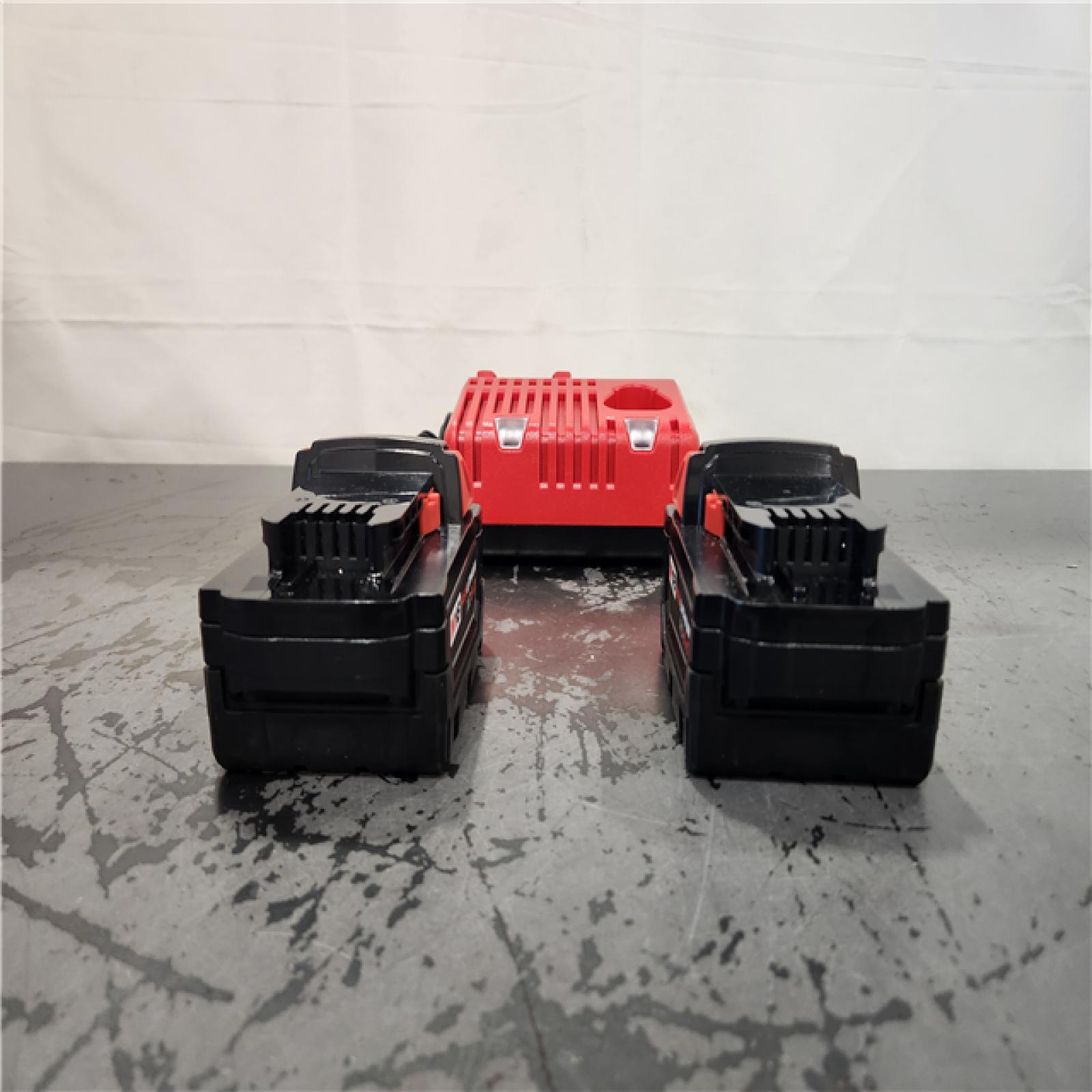AS-IS- Milwaukee 18-Volt Lithium-Ion XC Starter Kit with Two 5.0Ah Batteries and Charger