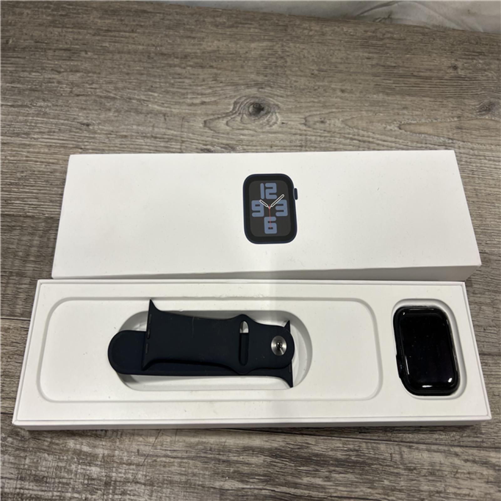 AS-IS Apple Watch SE 2nd Generation (GPS + Cellular) 44mm Aluminum Case with Midnight Sport Band - M/L - Midnight
