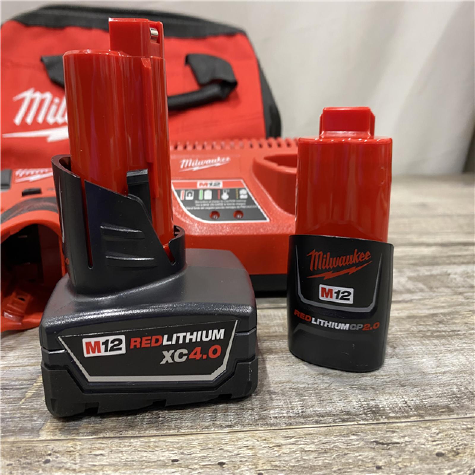 AS-IS Milwaukee FUEL 12-Volt Lithium-Ion Brushless Cordless Hammer Drill and Impact Driver Combo Kit