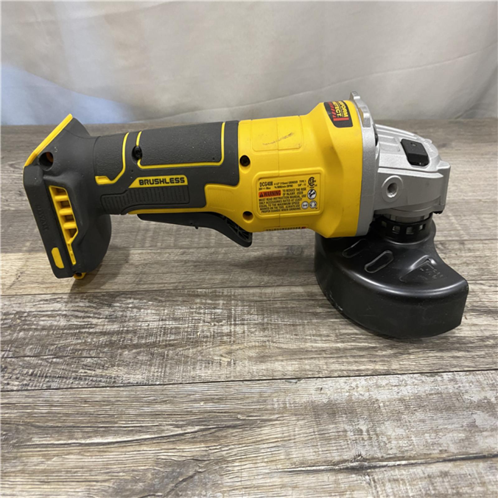 AS-IS DEWALT 20V MAX Cordless Brushless 4-1/2 in. Angle Grinder with Paddle Switch (Tool Only)