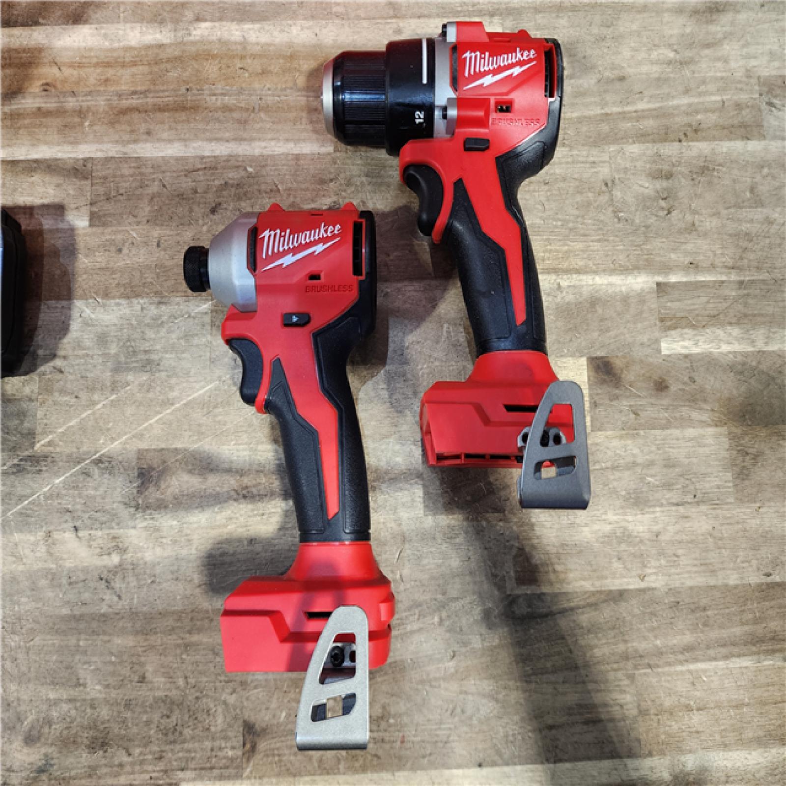 HOUSTON LOCATION - AS-IS Milwaukee M18 18V Lithium-Ion Brushless Cordless Compact Drill/Impact Combo Kit (2-Tool) W/(2) 2.0 Ah Batteries, Charger & Bag