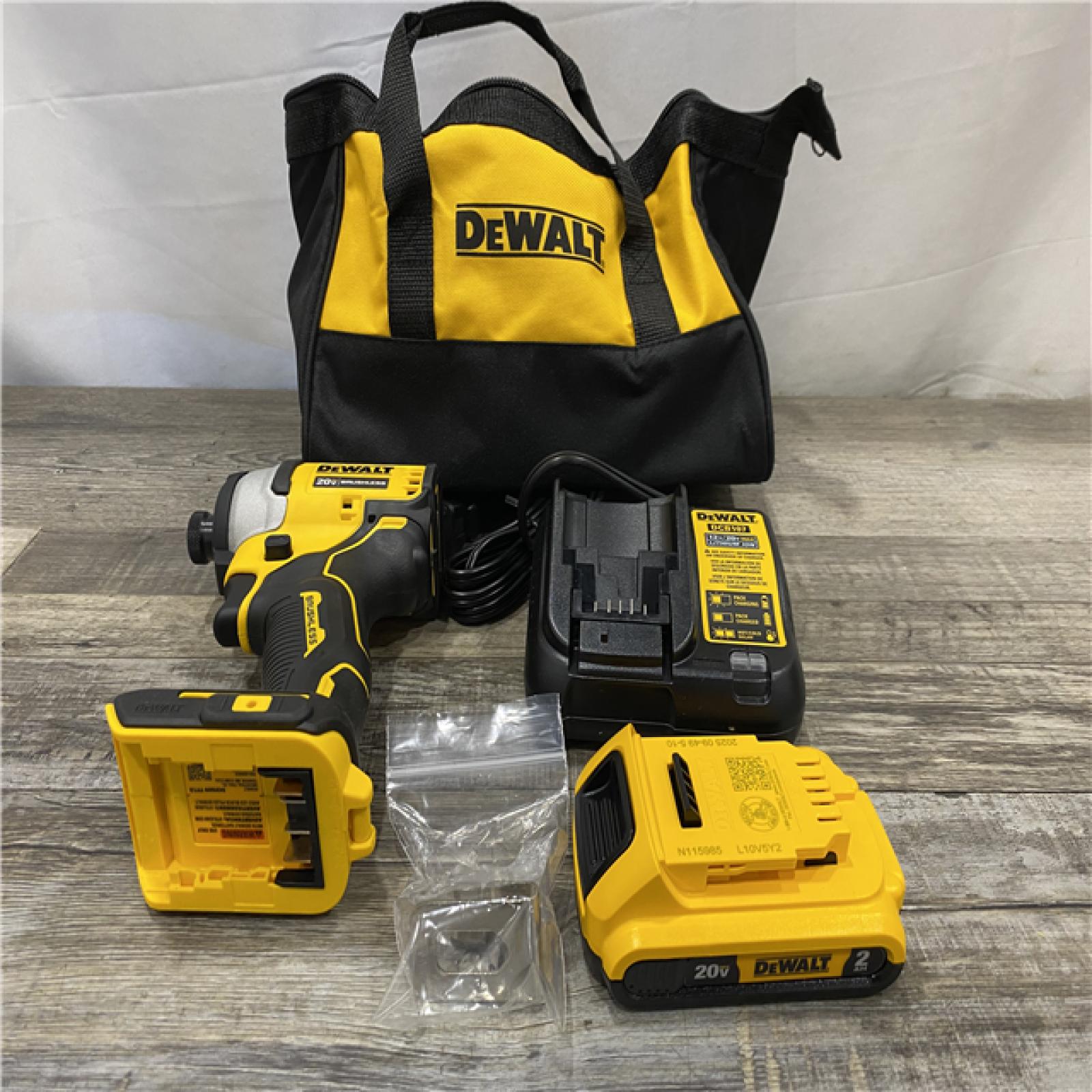AS-IS DEWALT Atomic 20V Max Lithium-Ion Brushless Cordless Compact 1/4 in. Impact Driver Kit