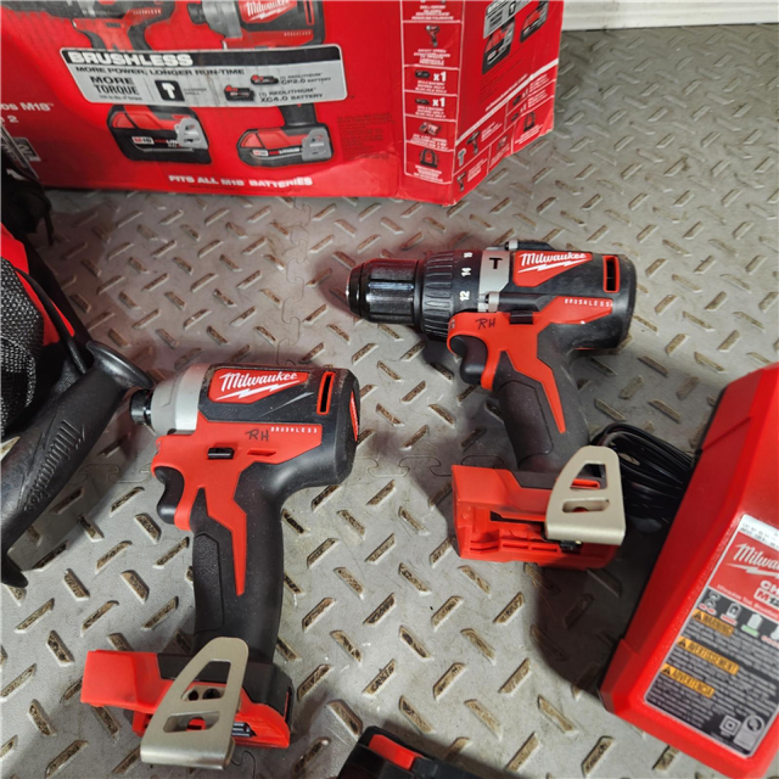 Houston location- AS-IS Milwaukee M18 Brushless 18V Lithium-Ion Drill/Impact Combo Kit with Case and Charger
