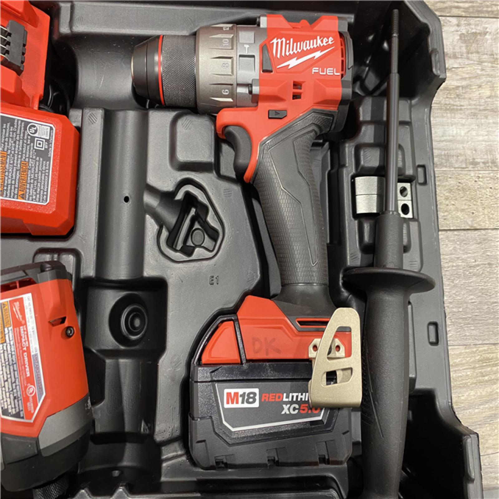 AS-IS Milwaukee FUEL 18V Lithium-Ion Brushless Cordless Hammer Drill and Impact Driver Combo Kit