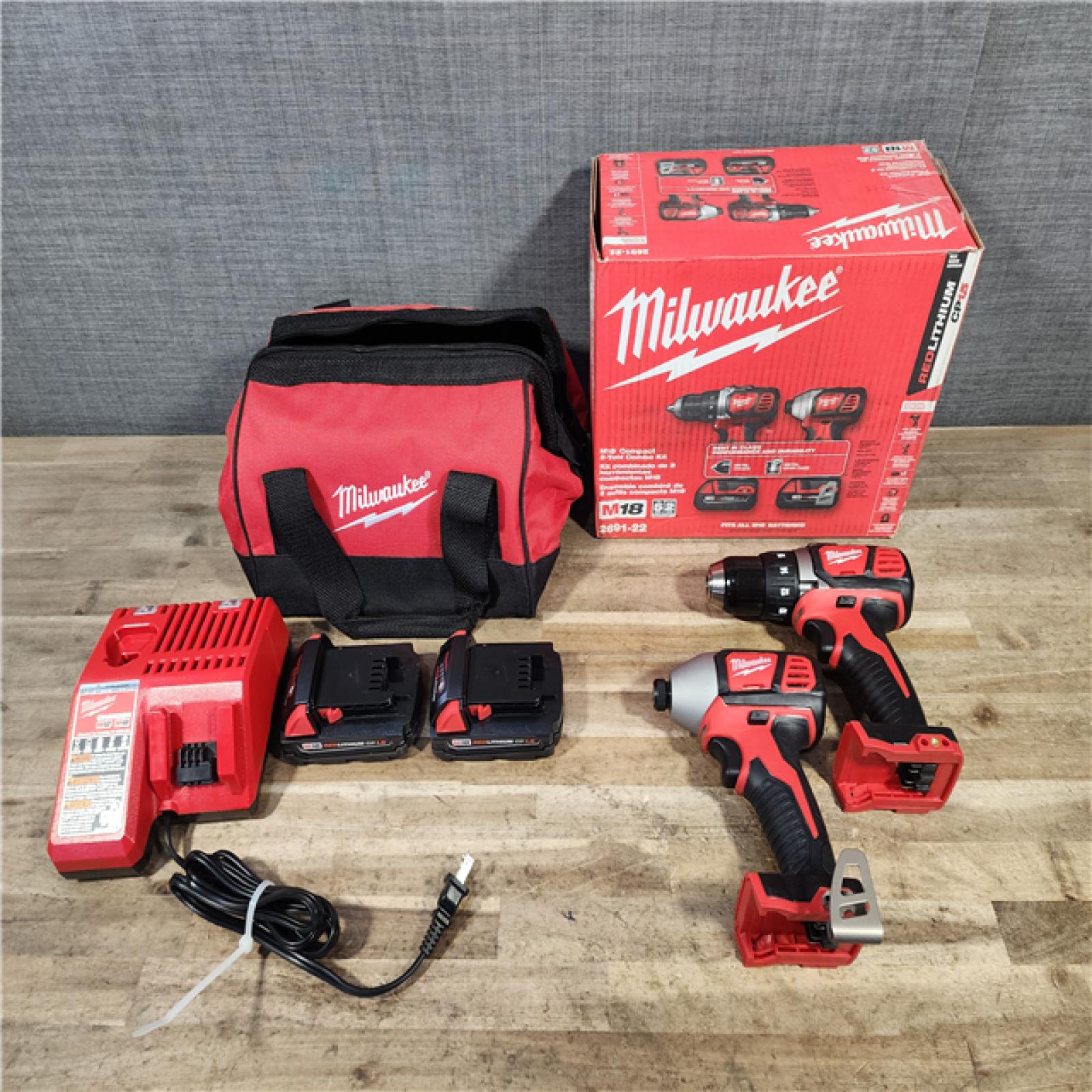 HOUSTON LOCATION - AS-IS Milwaukee 18V Lithium-Ion Cordless Drill Driver/Impact Driver Combo Kit