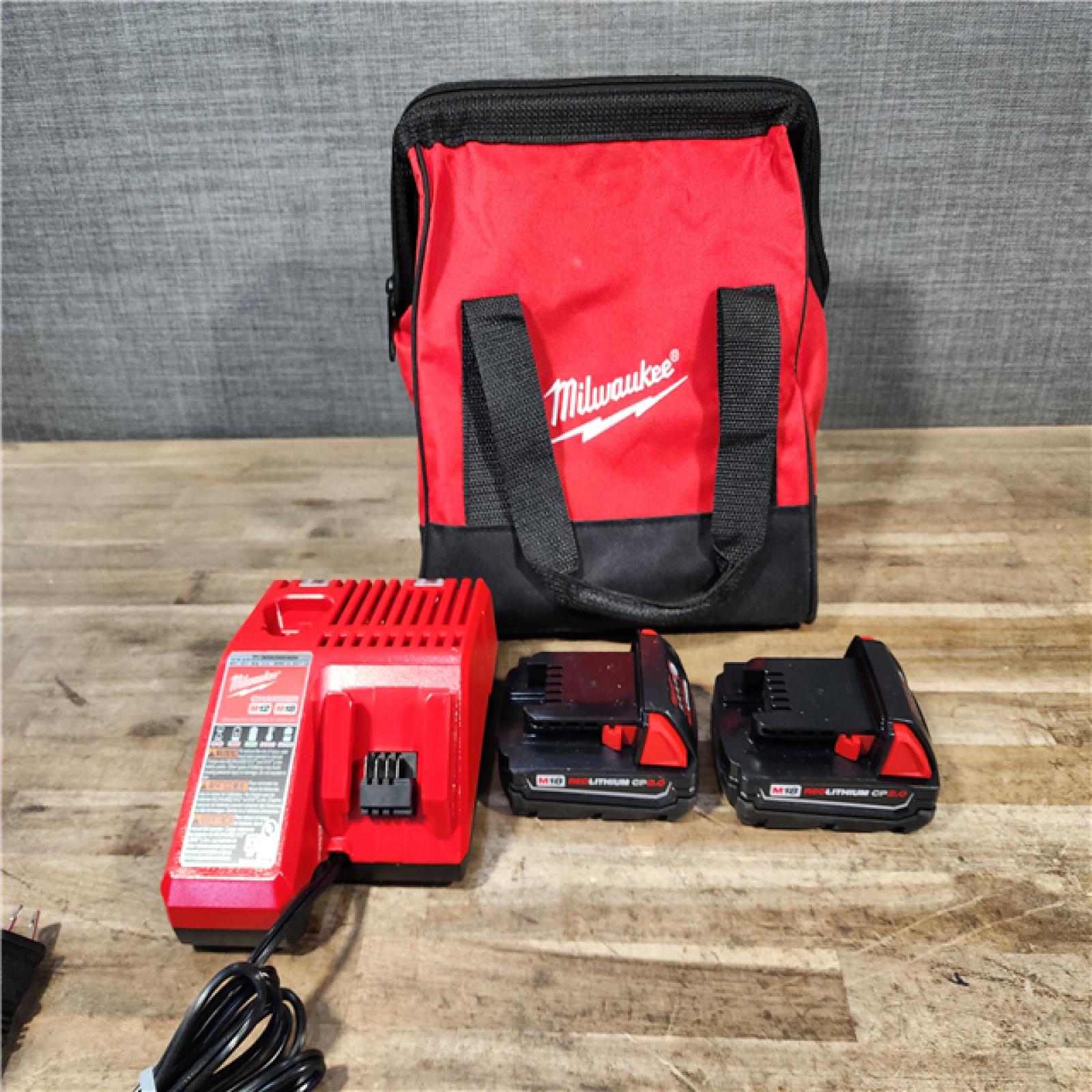 HOUSTON LOCATION - AS-IS Milwaukee M18 18V Lithium-Ion Brushless Cordless Compact Drill/Impact Combo Kit (2-Tool) W/(2) 2.0 Ah Batteries  Charger & Bag
