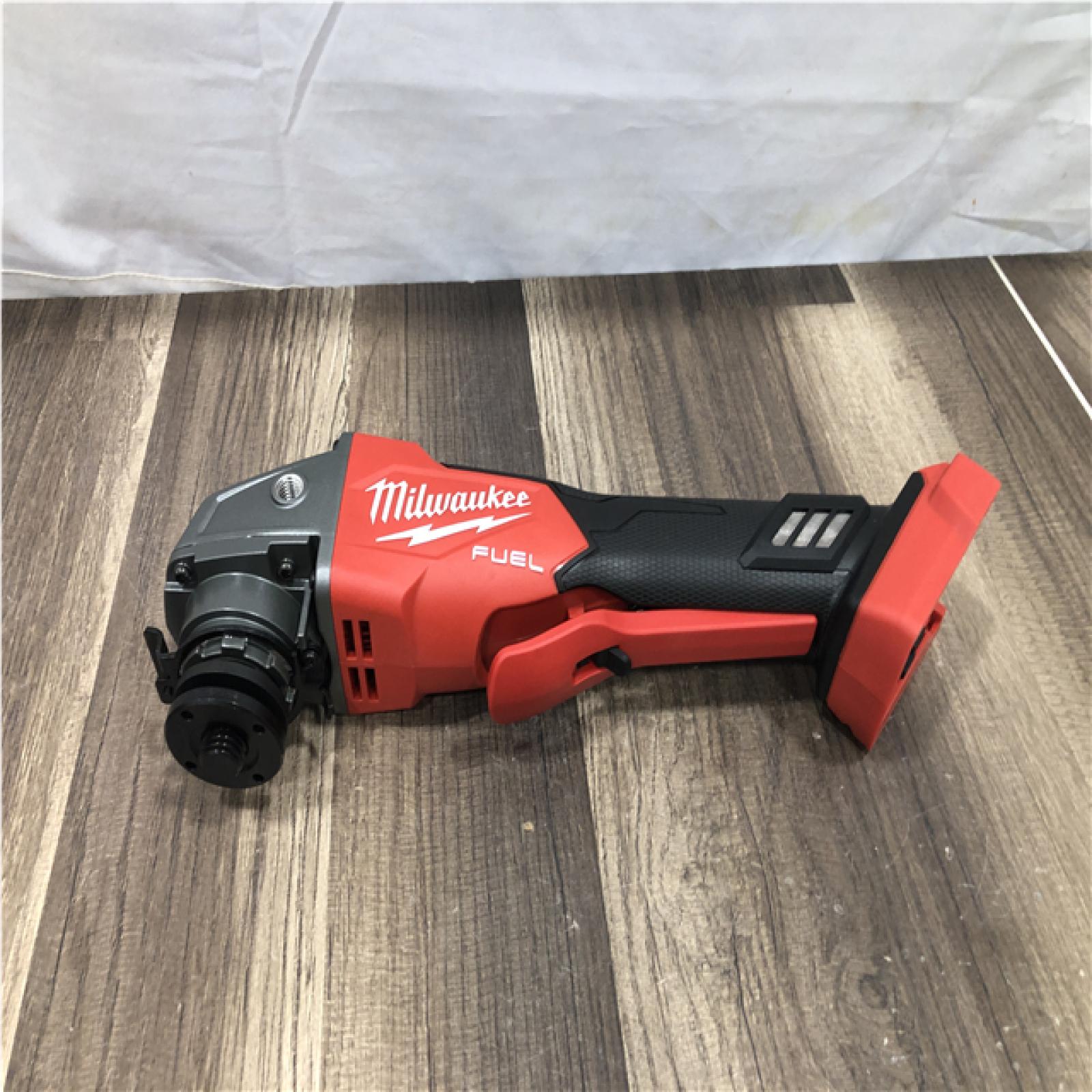 AS-IS Milwaukee FUEL 18V Lithium-Ion Brushless Cordless 4-1/2 in./5 in. Grinder with Variable Speed & Paddle Switch (Tool-Only)