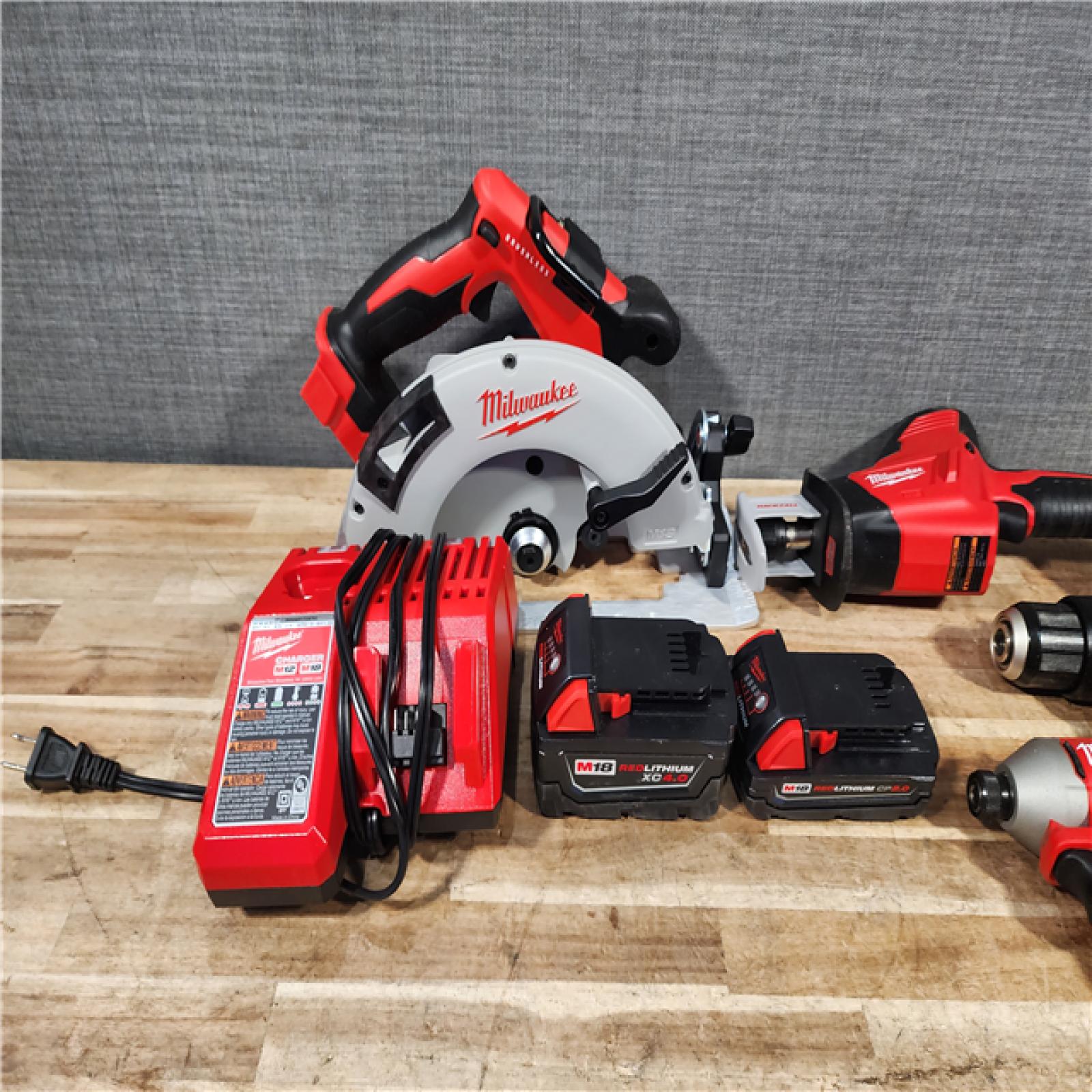 HOUSTON LOCATION - AS - IS Milwaukee 4 Tool Combo Kit W/ (2) Battery & Charger