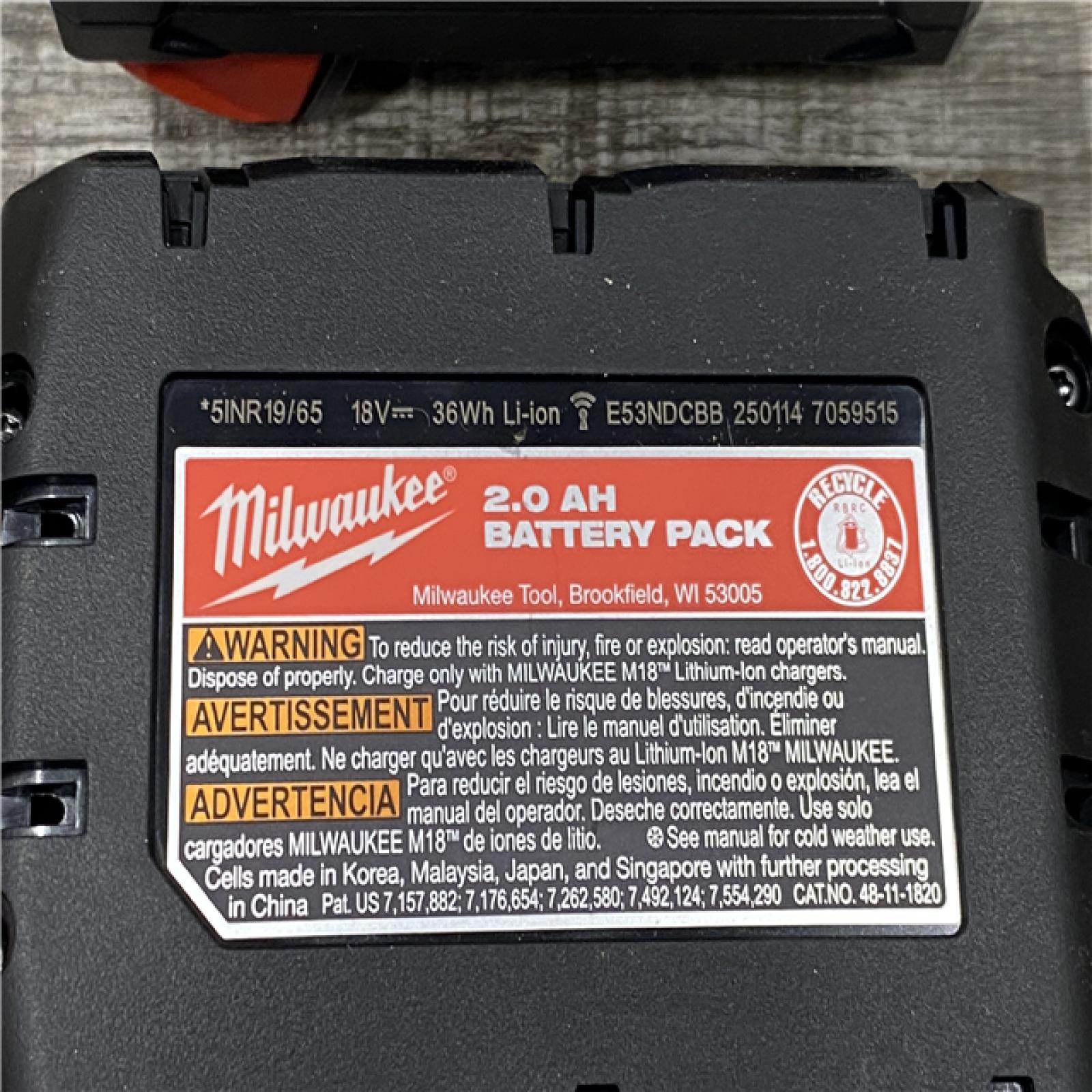 AS-IS Milwaukee 18-Volt Lithium-Ion Starter Kit with One 5.0 Ah and One 2.0 Ah Battery and Charger