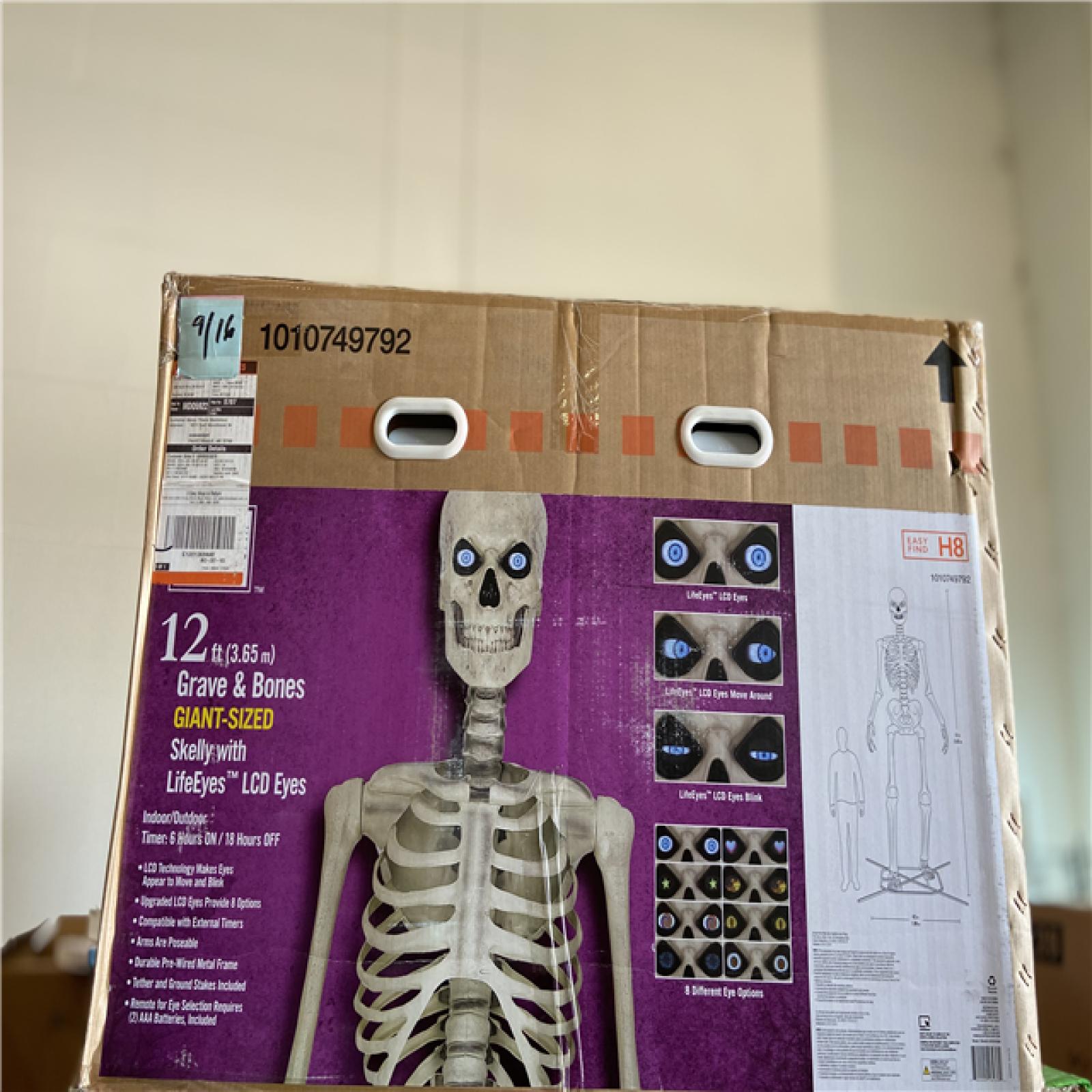 DALLAS LOCATION - Home Accents Holiday 12 ft. Grave & Bones Giant-Sized Skelly with LifeEyes™ LCD Eyes H5