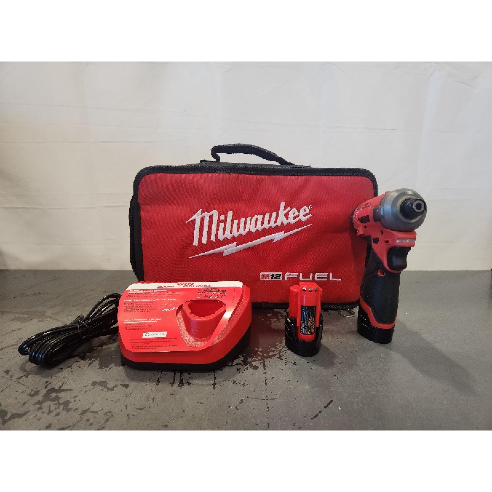 AS-IS-  Impact Driver Kit 1/4 in Hex Drive 12Vdc