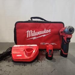 AS-IS-  Impact Driver Kit 1/4 in Hex Drive 12Vdc