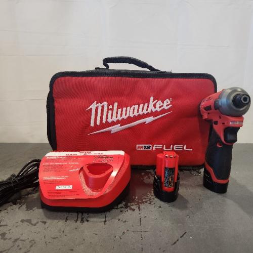 AS-IS-  Impact Driver Kit 1/4 in Hex Drive 12Vdc