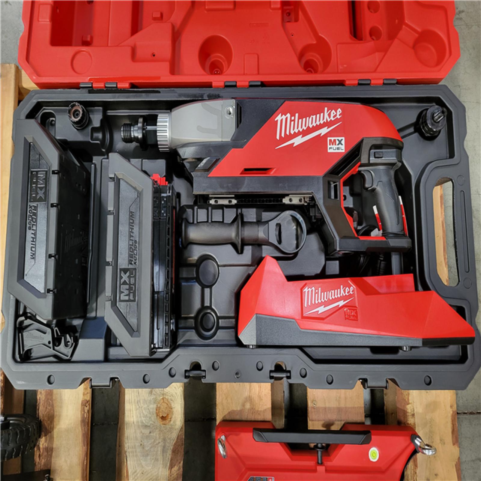 CALIFORNIA AS-IS MILWAUKEE HANDHELD CORE DRILL AND COMPACT STAND WITH 2 BATTERIES AND CHARGER INCLUDED