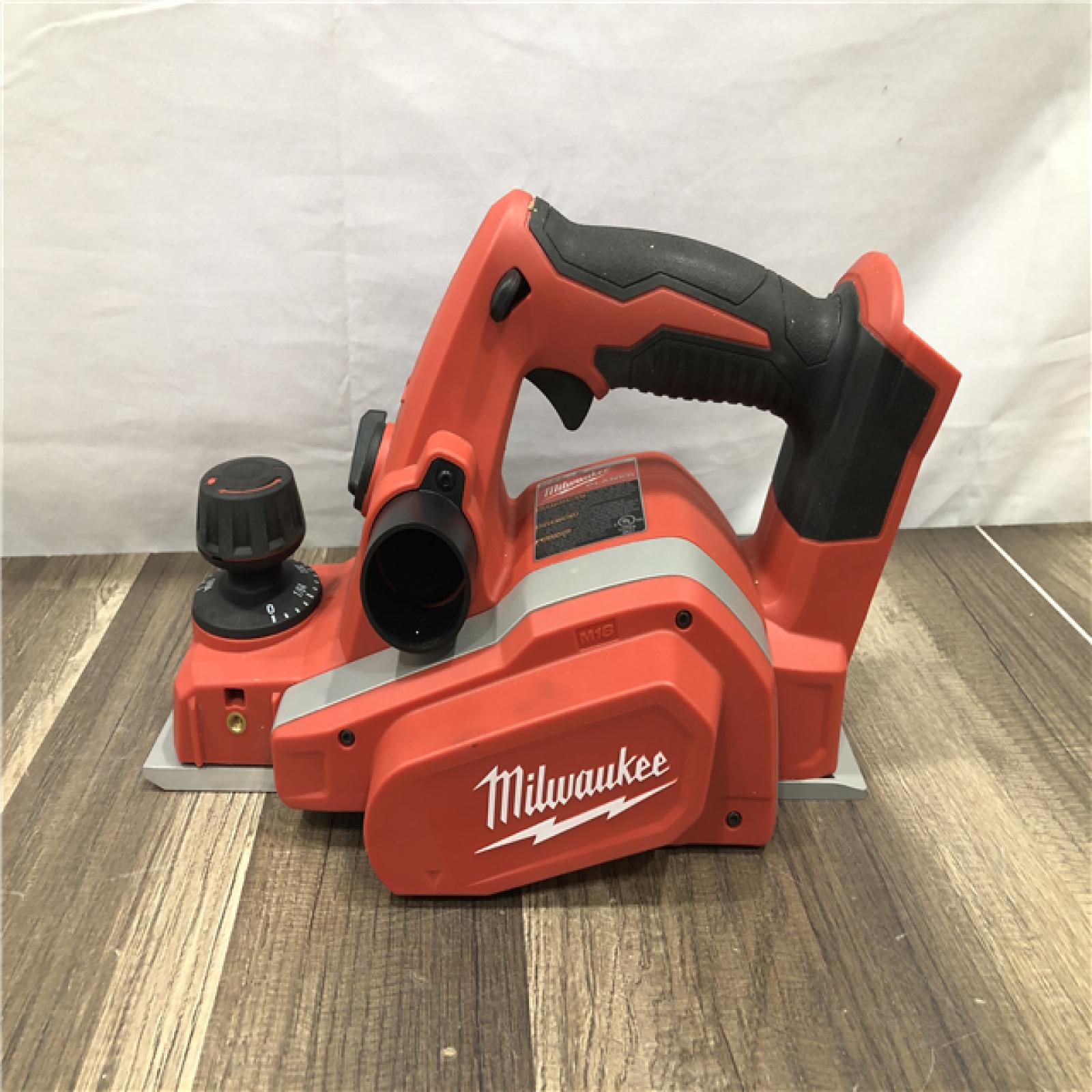 AS-IS Milwaukee M18 18V Lithium-Ion Cordless 3-1/4 in. Planer (Tool-Only)