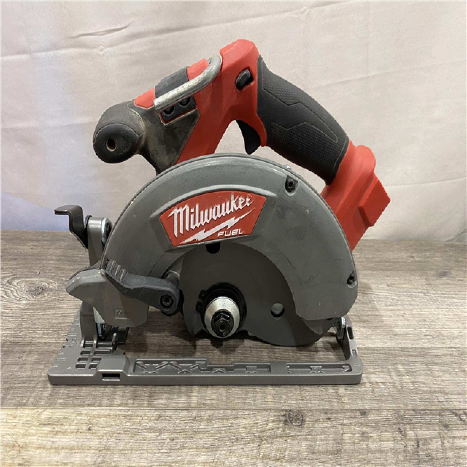 AS-IS Milwaukee FUEL 18V Lithium-Ion Brushless Cordless 6-1/2 in. Circular Saw (Tool-Only)