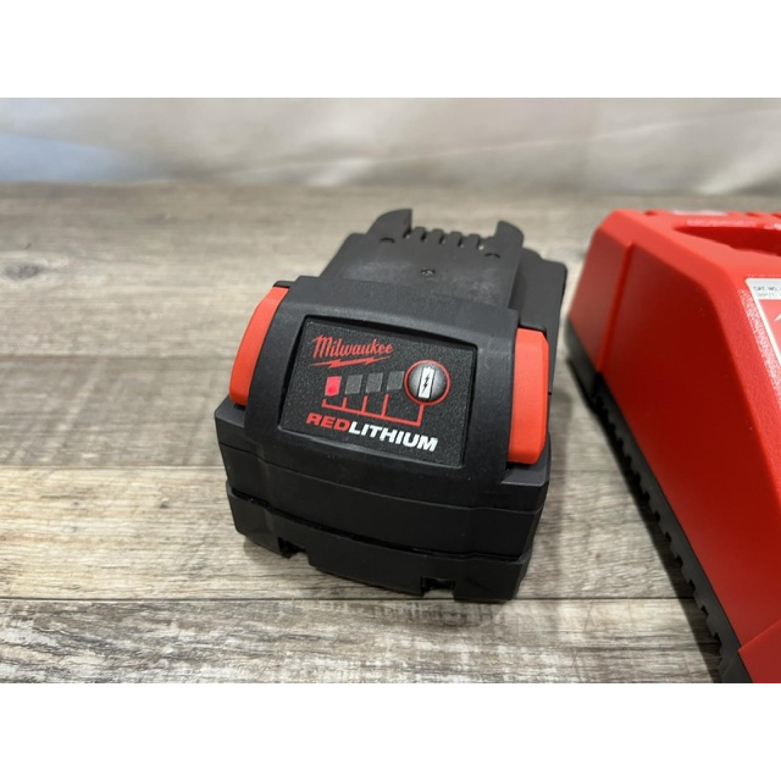 AS-IS Milwaukee 18-Volt Lithium-Ion XC Starter Kit with One 5.0Ah Battery and Charger